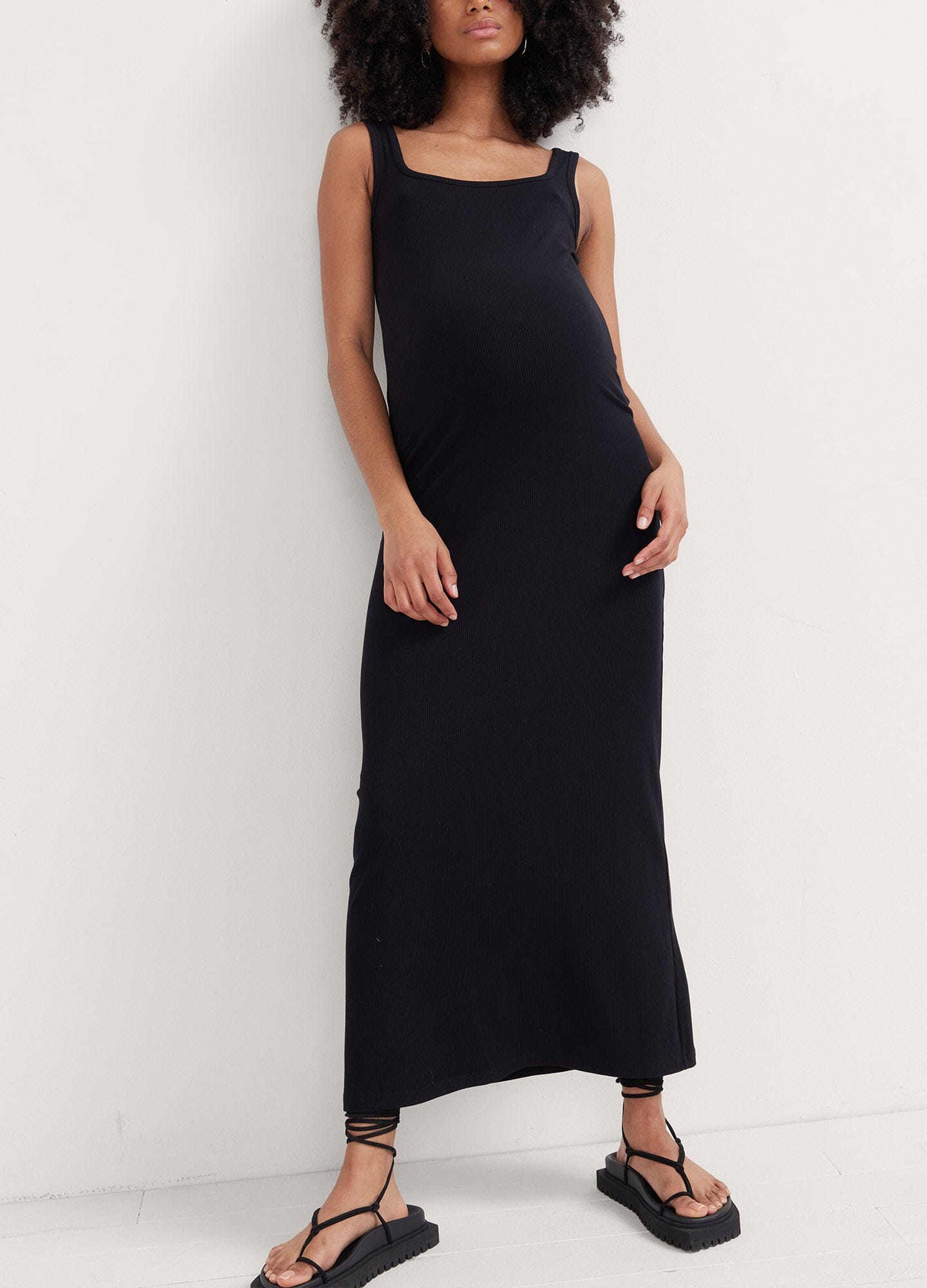 The Long Body Tank Dress - Black long maternity tank dress with scoop neckline, sleeveless fit flatters pregnancy and nursing stages.
