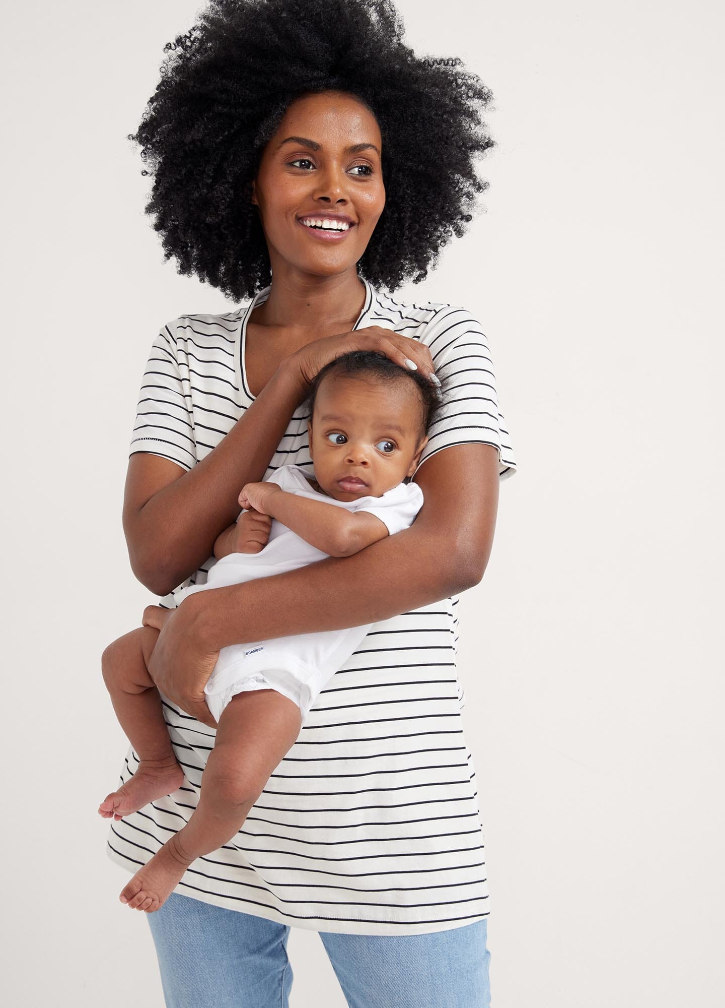 The Luxe Nursing Tee - White short-sleeve maternity nursing tee with scoop neckline, designed for pregnancy and postpartum comfort.