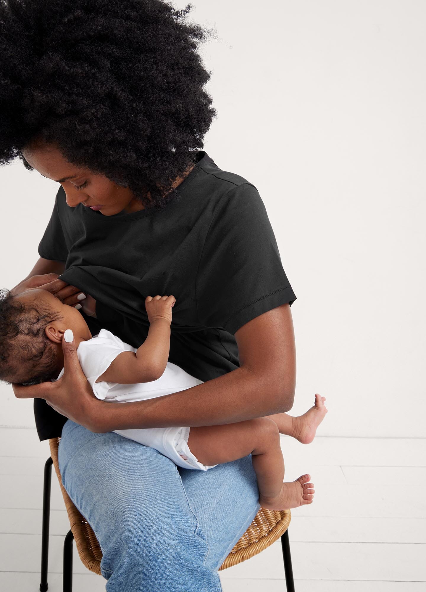 The Luxe Nursing Tee - White short-sleeve maternity nursing tee with scoop neckline, designed for pregnancy and postpartum comfort.