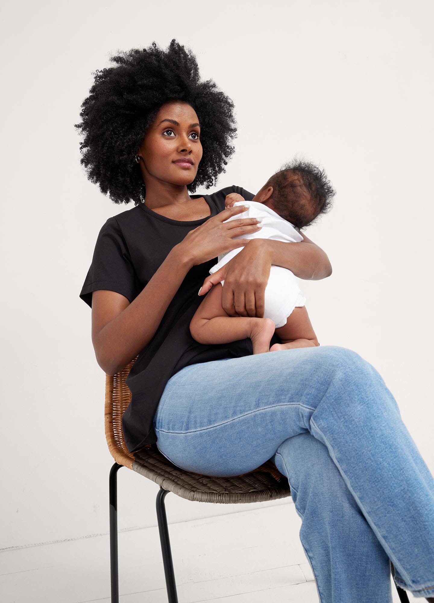 The Luxe Nursing Tee - White short-sleeve maternity nursing tee with scoop neckline, designed for pregnancy and postpartum comfort.