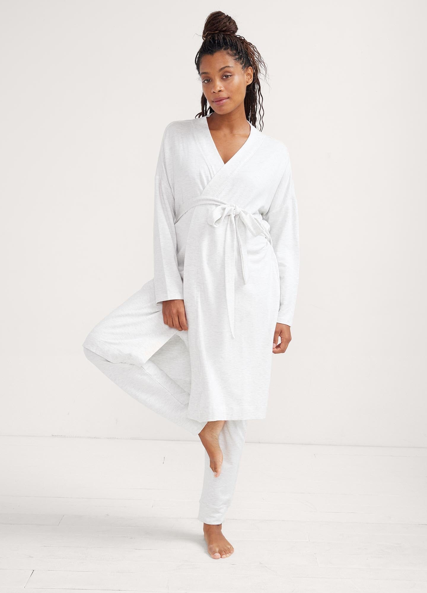 The Robe - Soft white maternity robe with waist tie, designed for pregnancy, nursing, and postpartum comfort.