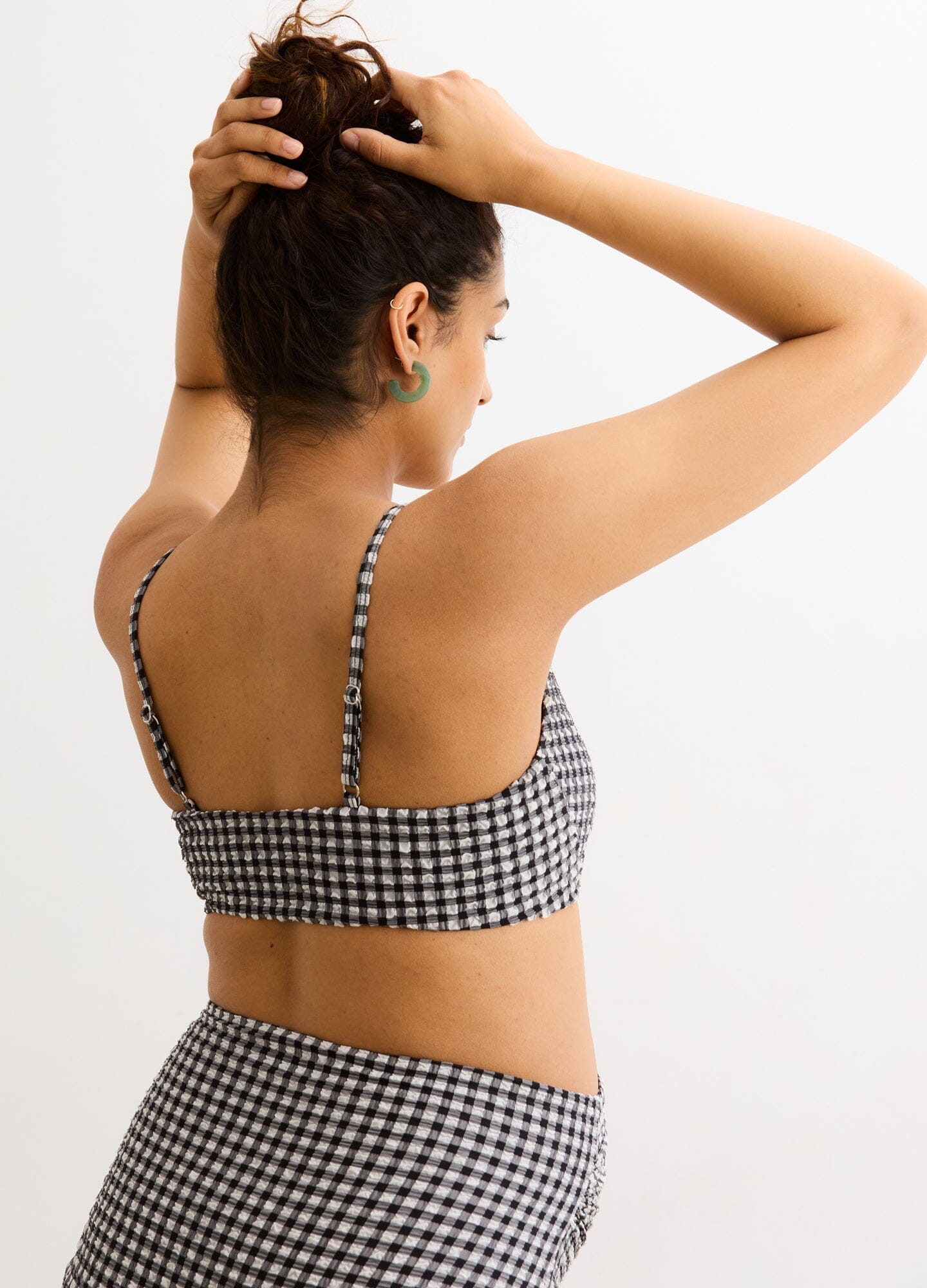 The Zanzibar Bikini - Black and white gingham maternity bikini with adjustable straps designed for nursing and postpartum comfort.