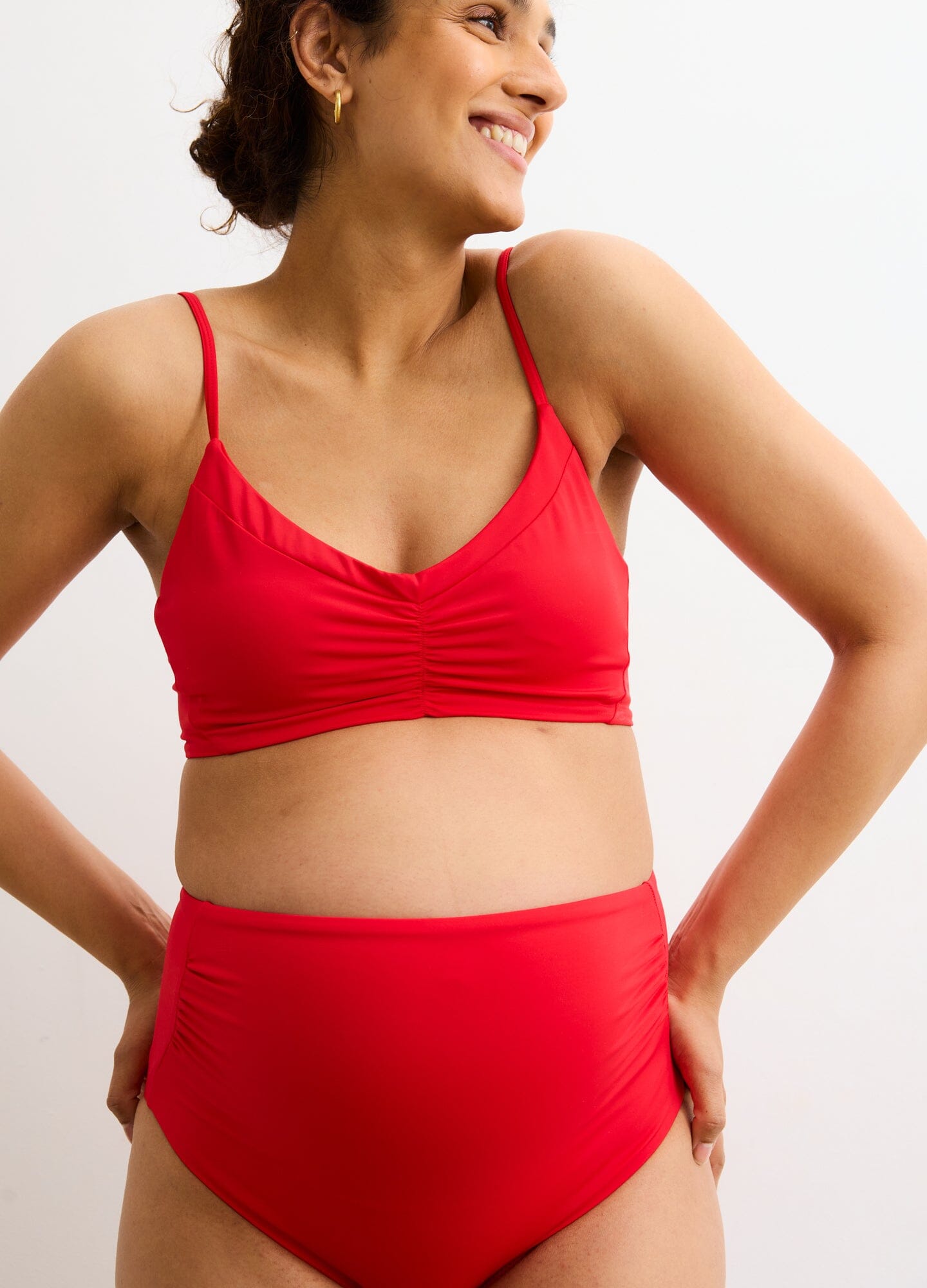 The Zanzibar Bikini - Red maternity bikini with ruched nursing-friendly top and high-waist postpartum bottoms.
