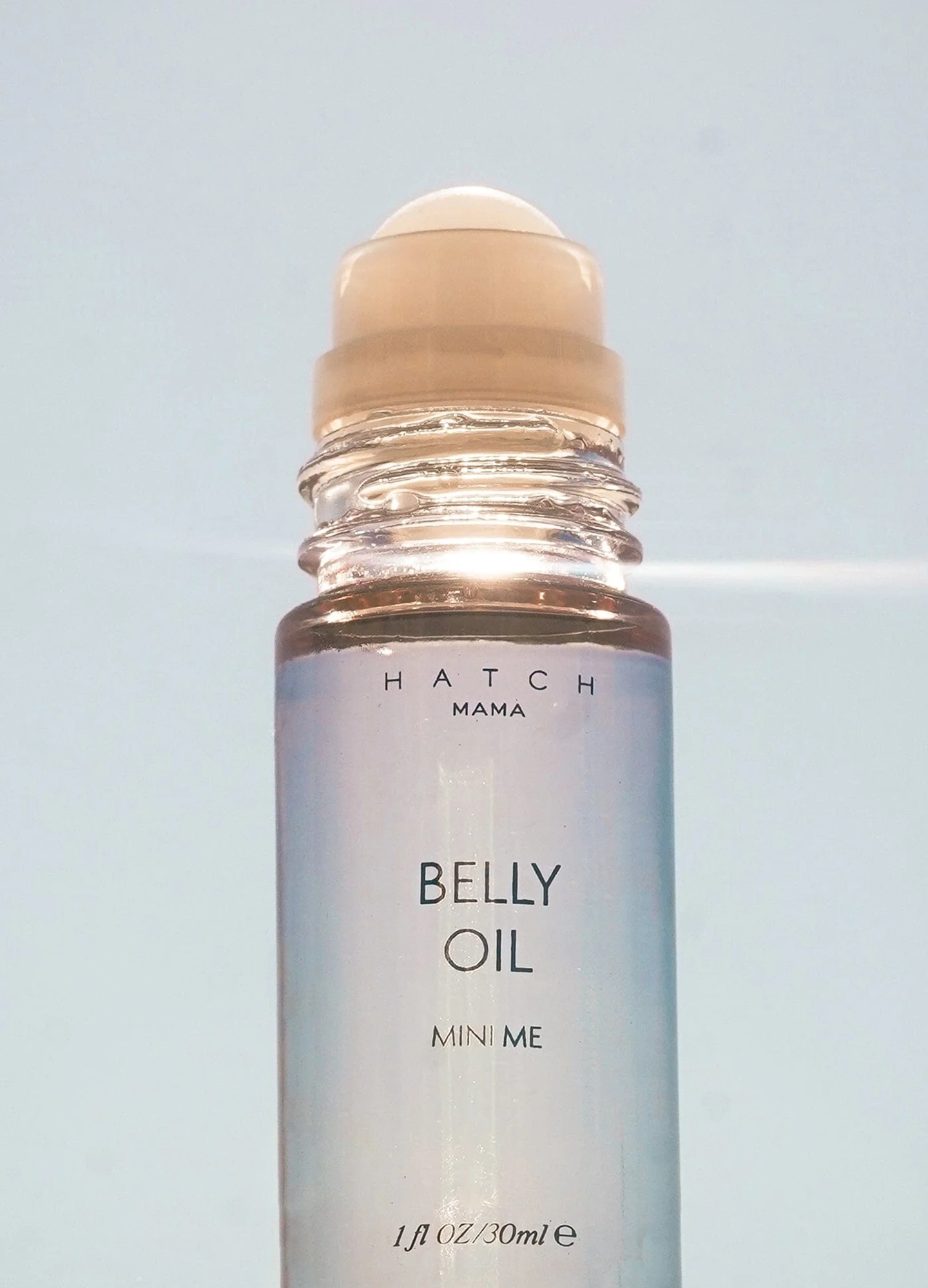 Belly Oil Mini Me - Hatch Mama Belly Oil Mini Me 1 oz roller bottle for maternity, pregnancy, nursing, and postpartum care.