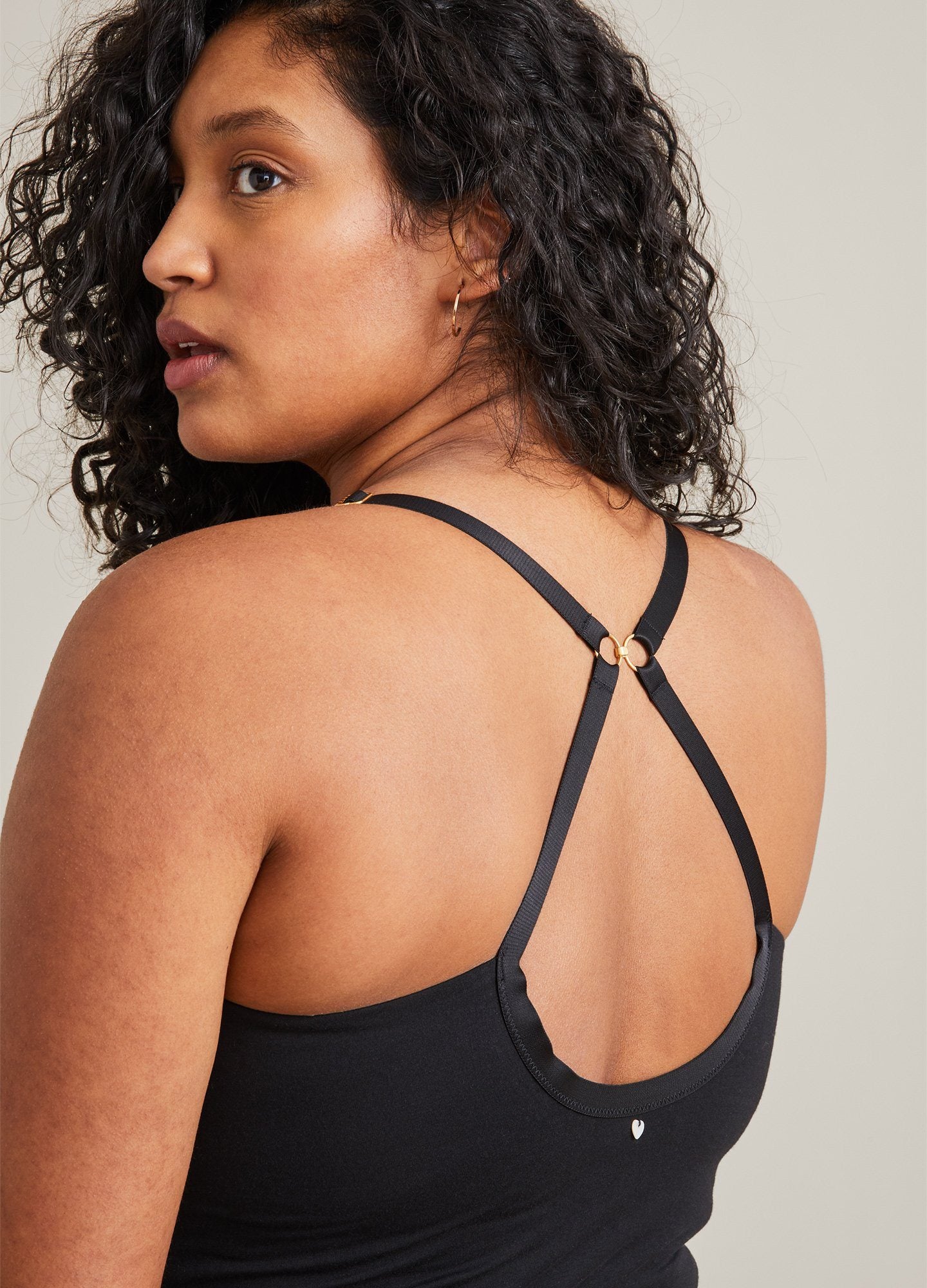 The 24/7 Nursing Tank POS - Buff-colored nursing tank with scoop neckline and slim straps, designed for maternity and postpartum wear.