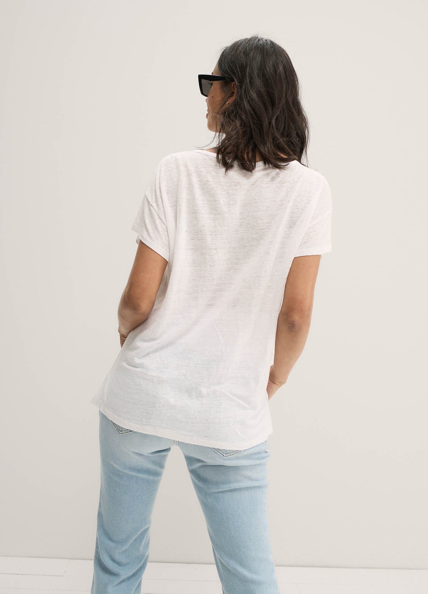 The Everyday Linen Tee - White linen maternity tee with short sleeves and relaxed fit for pregnancy, nursing, and postpartum wear.