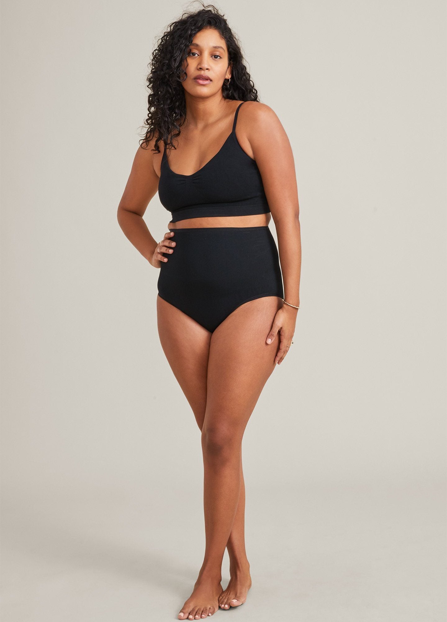 The Seamless Belly Brief - Black seamless high-waisted belly brief designed for maternity, pregnancy, nursing, and postpartum support.