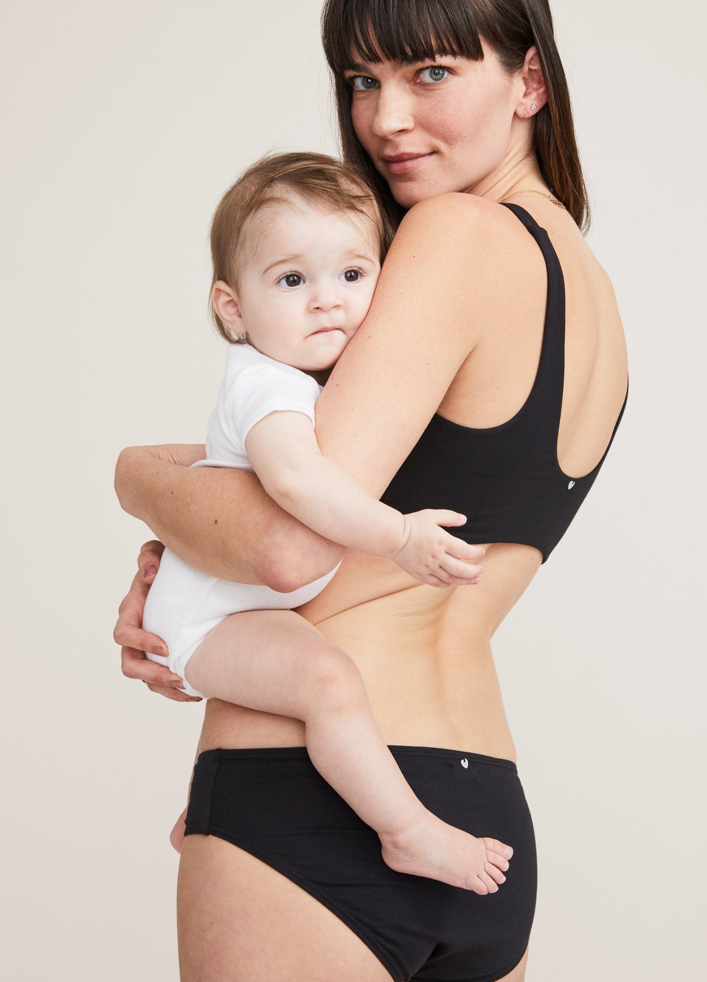The Everyday Brief - Black seamless maternity brief and matching nursing bra with soft stretch fabric designed for pregnancy and postpartum.