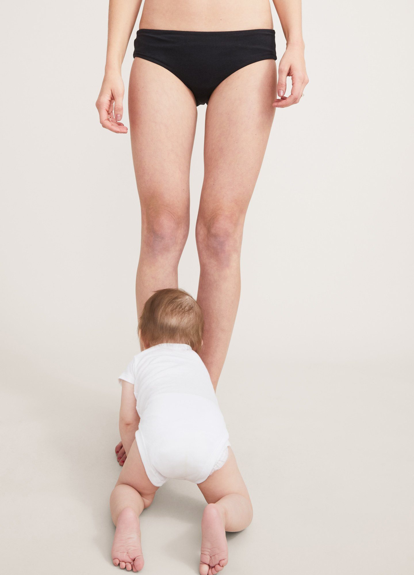 The Everyday Brief - Black seamless maternity brief and matching nursing bra with soft stretch fabric designed for pregnancy and postpartum.