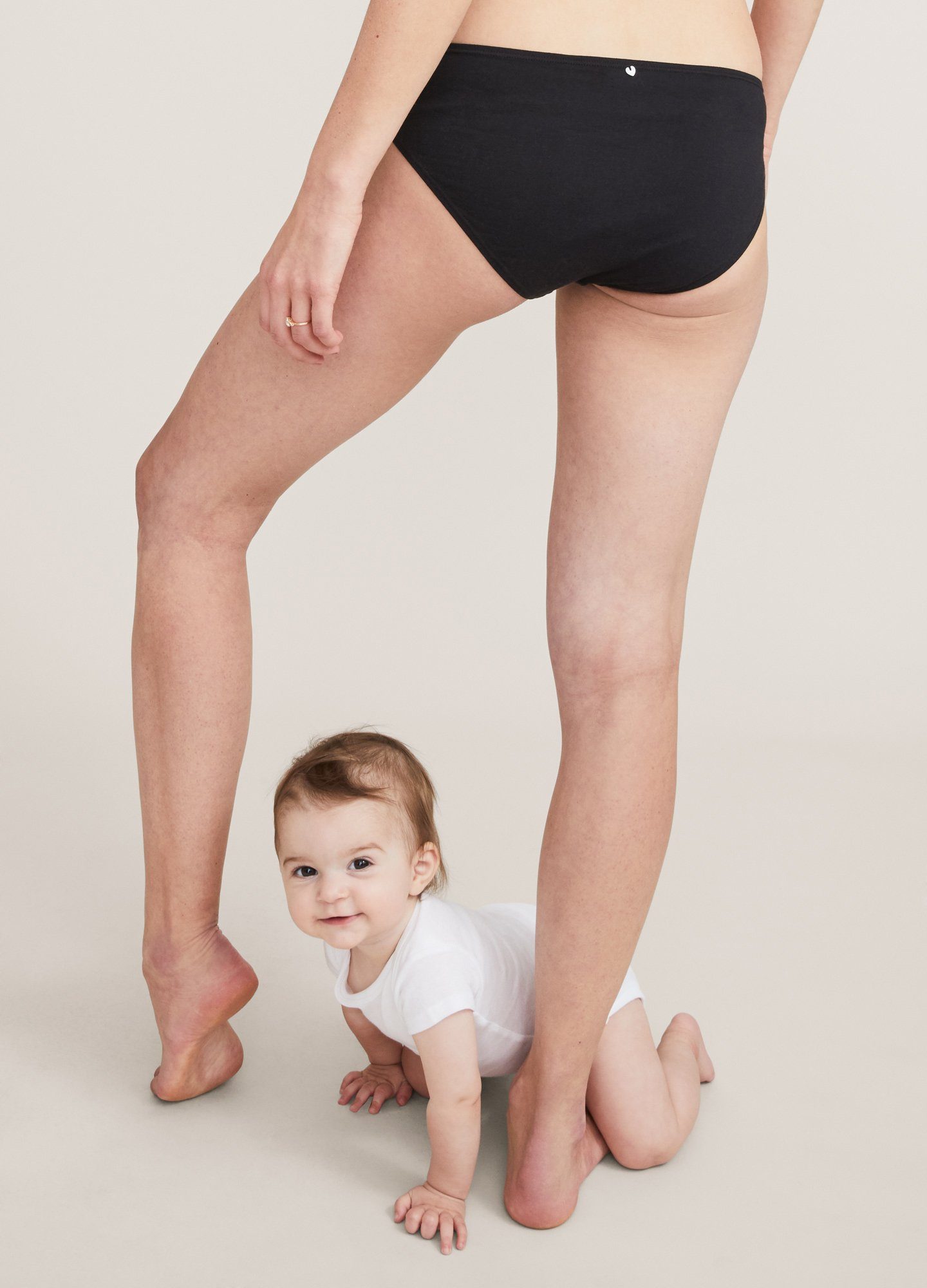 The Everyday Brief - Black seamless maternity brief and matching nursing bra with soft stretch fabric designed for pregnancy and postpartum.