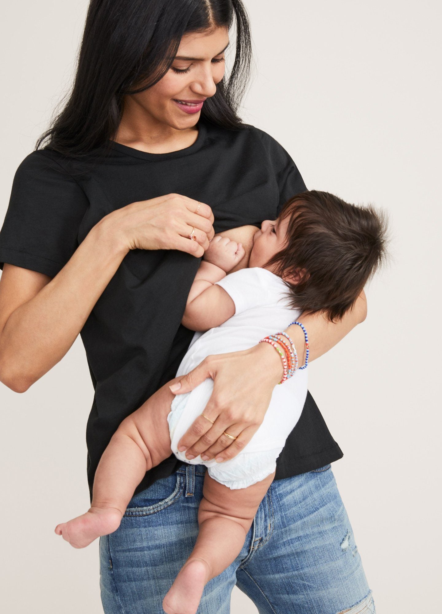 The Luxe Nursing Tee - White short-sleeve maternity nursing tee with scoop neckline, designed for pregnancy and postpartum comfort.