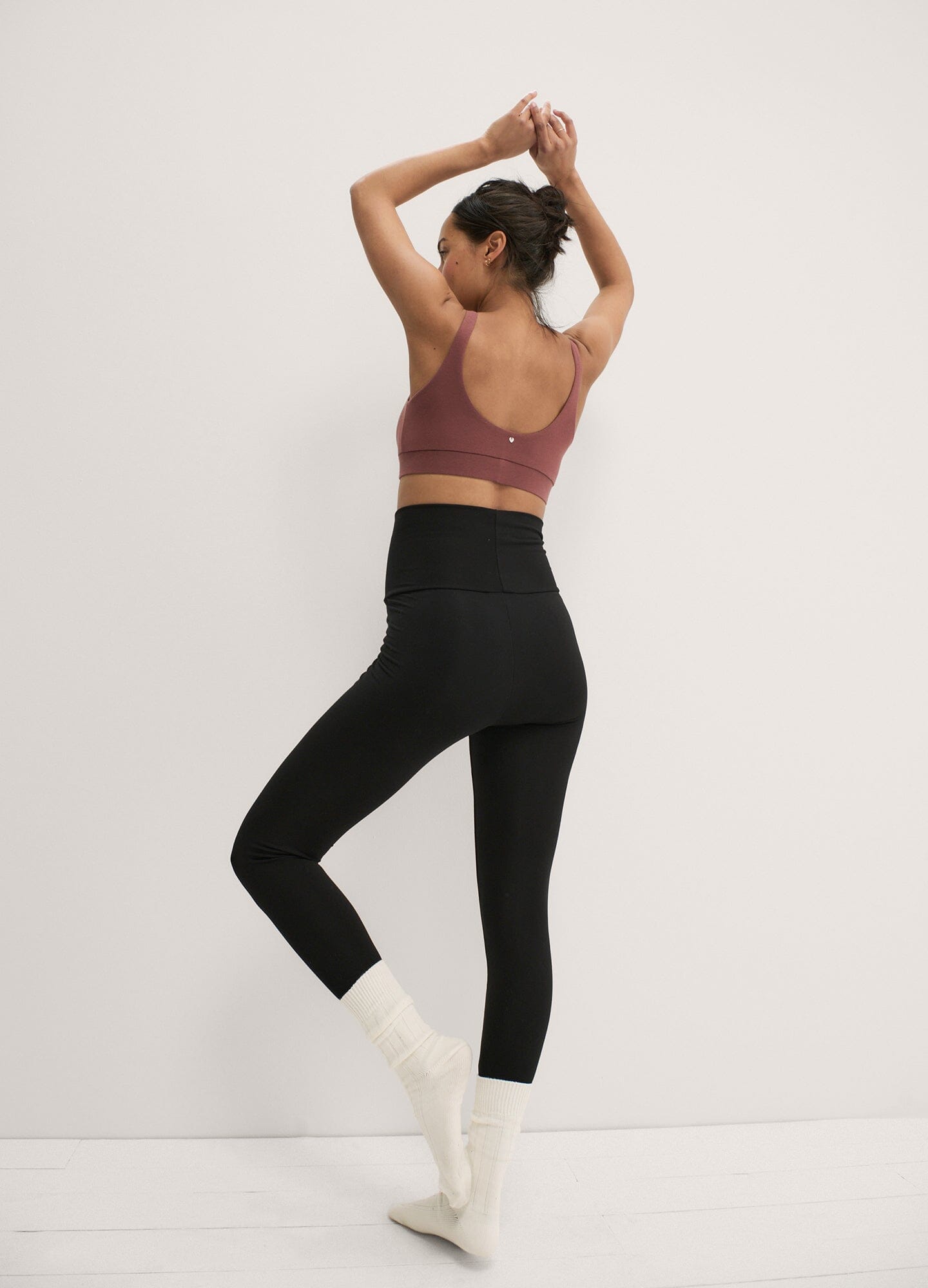 The Ultra Soft Before, During And After Legging - Black high-waist maternity leggings with soft stretch fabric, modeled for pregnancy and postpartum comfort.