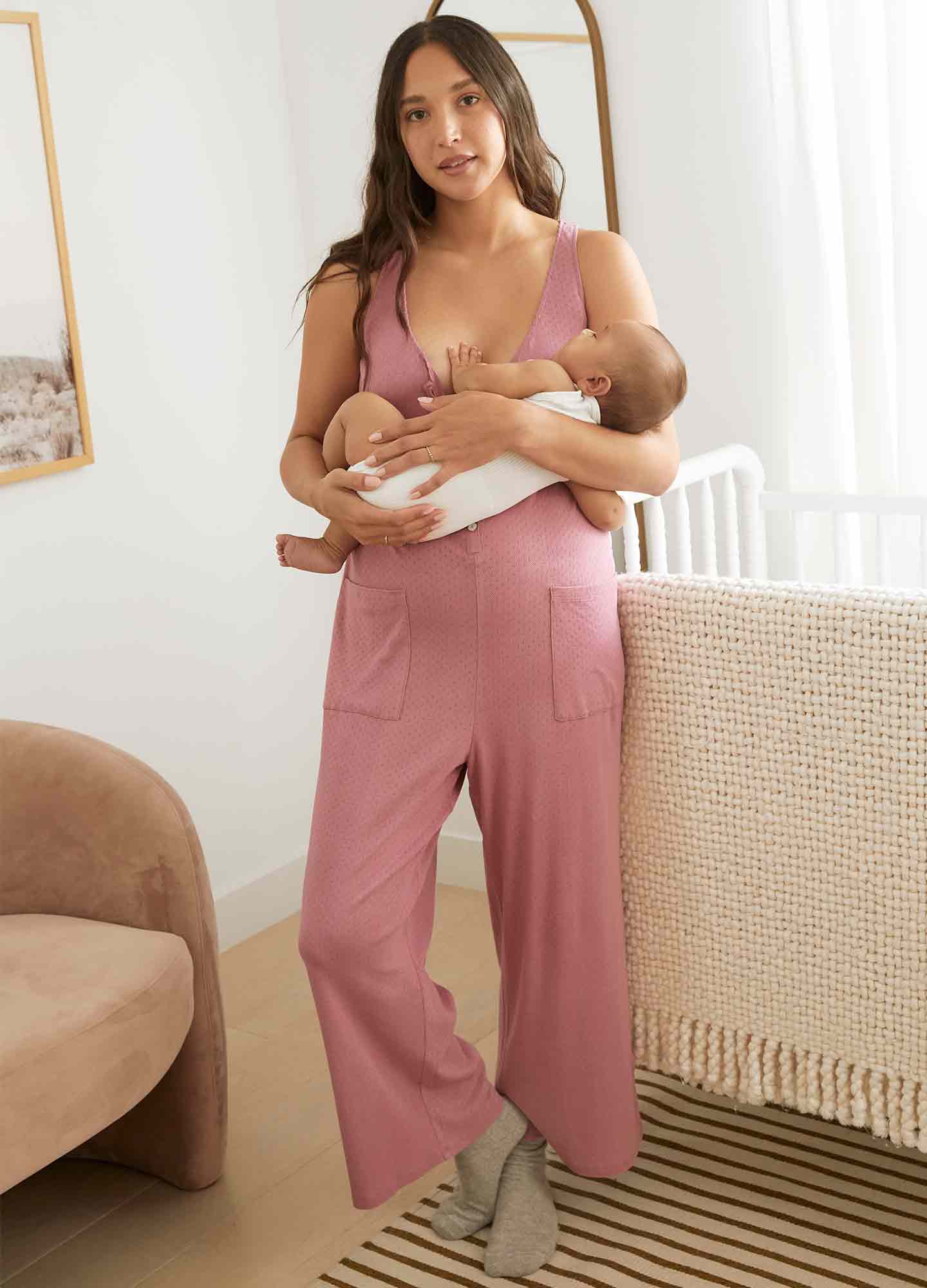 The 24/7 Feeding Jumpsuit POS - Lilac maternity jumpsuit with sleeveless V-neck, nursing-friendly front buttons, and wide-leg fit for postpartum comfort.