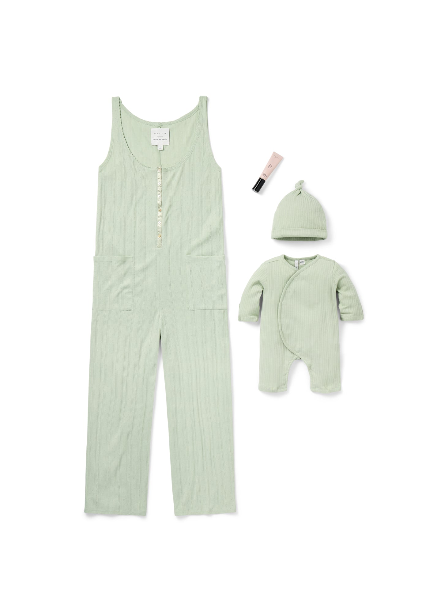 Light green ribbed sleeveless maternity jumpsuit with buttons, plus matching baby romper and hat set.