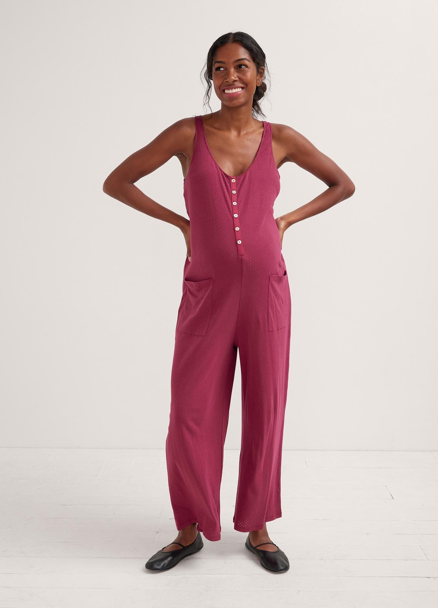 The 24/7 Feeding Jumpsuit POS - Lilac maternity jumpsuit with sleeveless V-neck, nursing-friendly front buttons, and wide-leg fit for postpartum comfort.