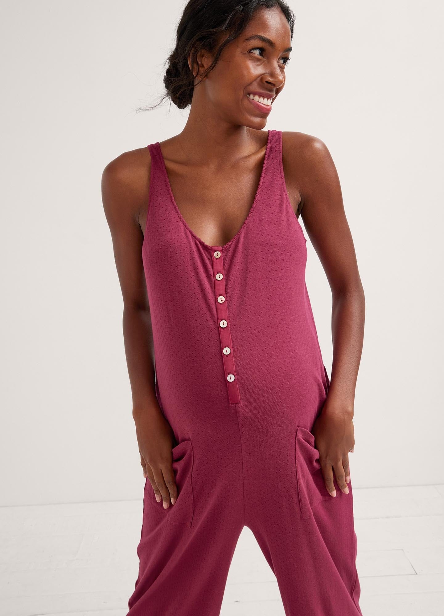 The 24/7 Feeding Jumpsuit POS - Lilac maternity jumpsuit with sleeveless V-neck, nursing-friendly front buttons, and wide-leg fit for postpartum comfort.