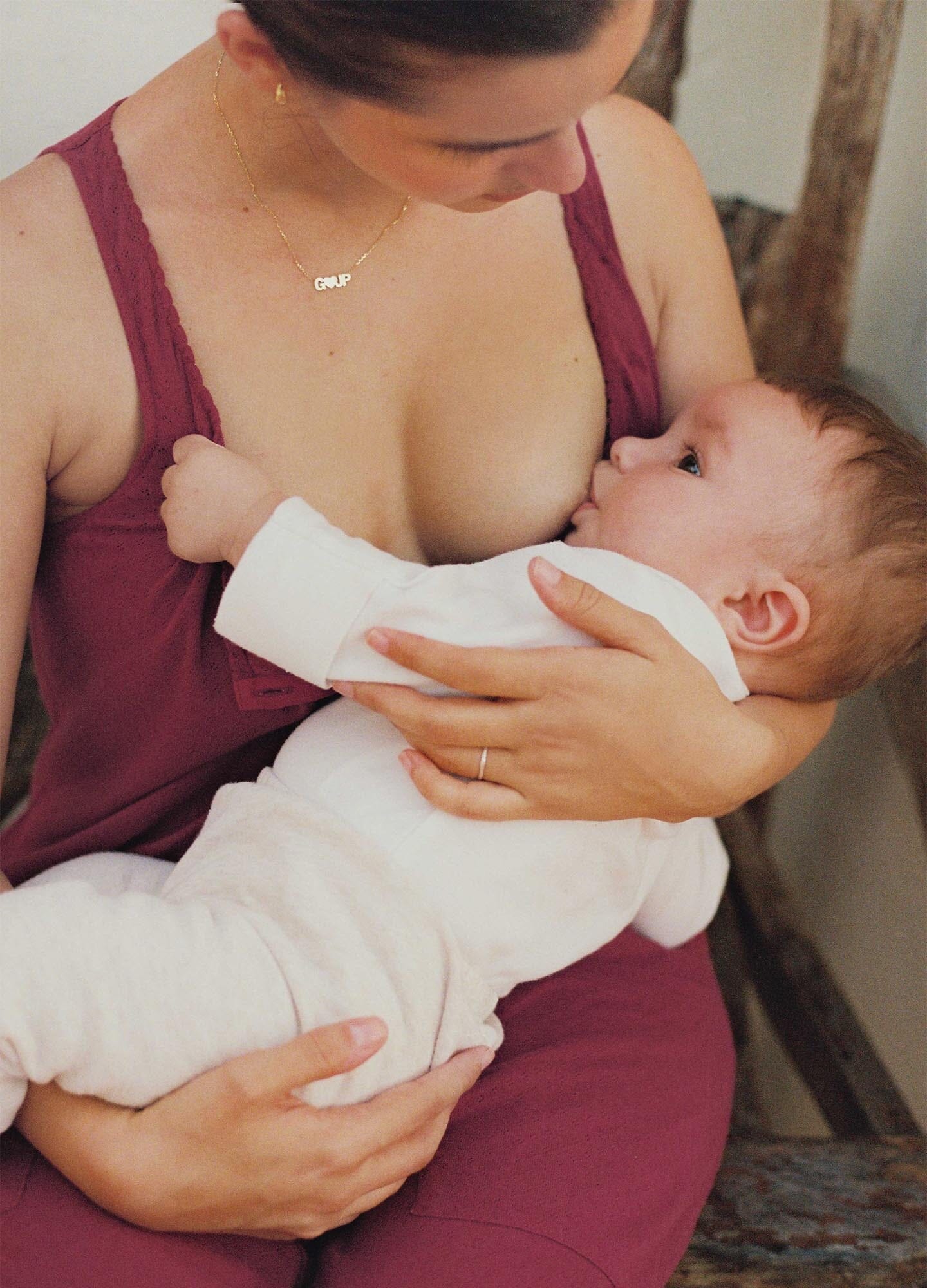 The 24/7 Feeding Jumpsuit POS - Lilac maternity jumpsuit with sleeveless V-neck, nursing-friendly front buttons, and wide-leg fit for postpartum comfort.