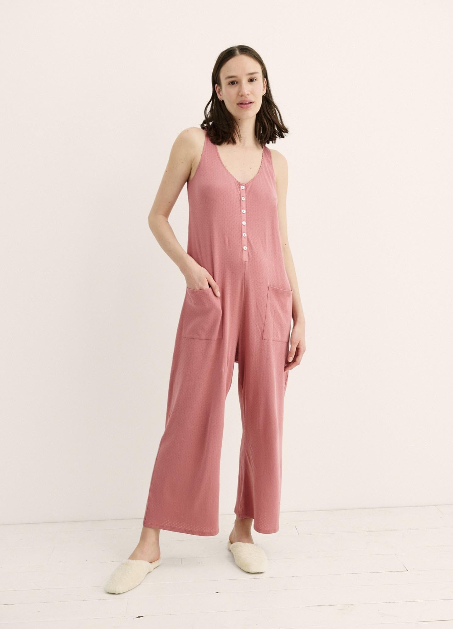 The 24/7 Feeding Jumpsuit POS - Lilac maternity jumpsuit with sleeveless V-neck, nursing-friendly front buttons, and wide-leg fit for postpartum comfort.