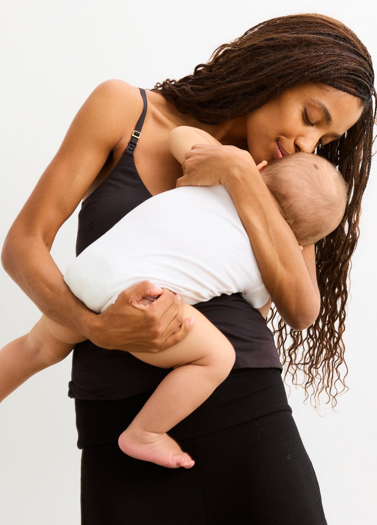 The 24/7 Nursing Tank - Black maternity nursing tank with convenient side access, soft stretch fabric for pregnancy and postpartum comfort.