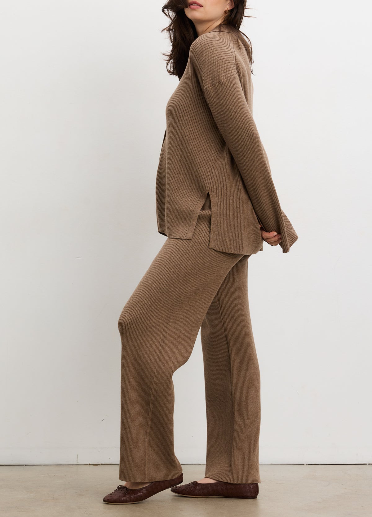Taupe ribbed knit maternity pants with wide legs, paired with a matching long-sleeve top.