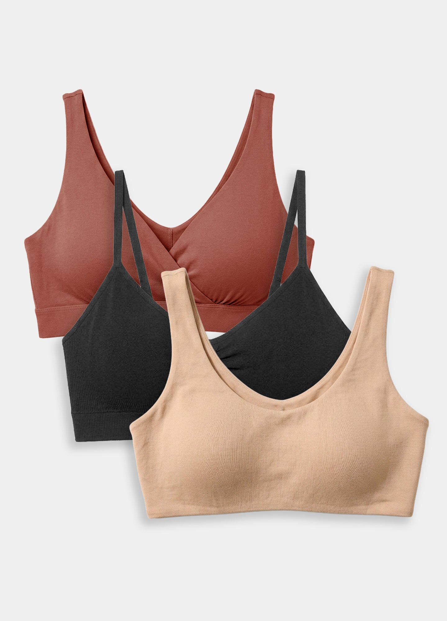 Set of three maternity bras in rust, black, and beige with soft, stretch fabric and supportive straps.
