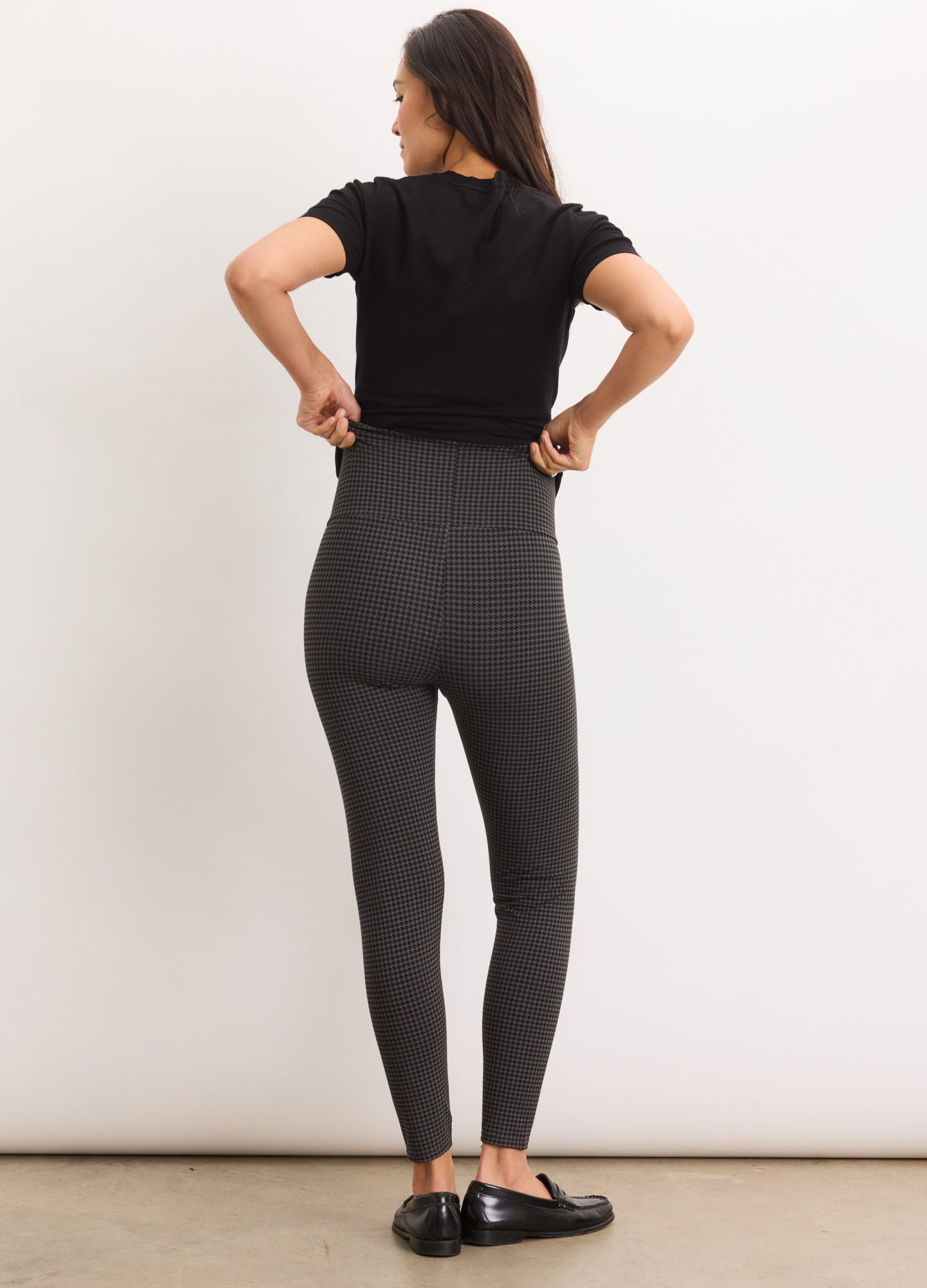 High-waist charcoal gray maternity leggings with a smooth, stretchy fabric fit for pregnancy support.