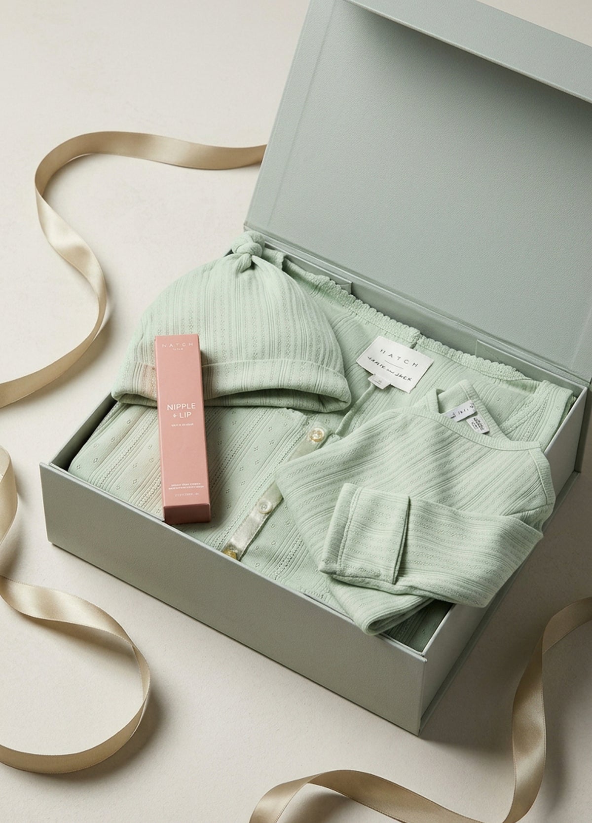 Soft sage green ribbed maternity loungewear set with nursing bra and matching shorts in a gift box.