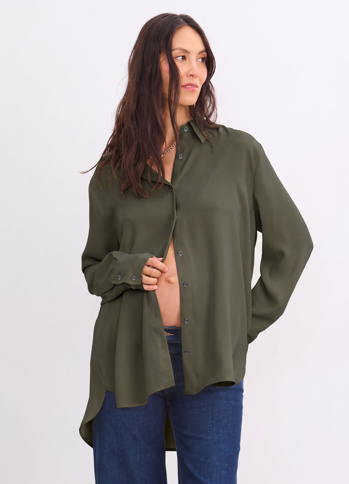 Olive green drapey button-down shirt with a pointed collar, long sleeves, and a curved high-low hem.