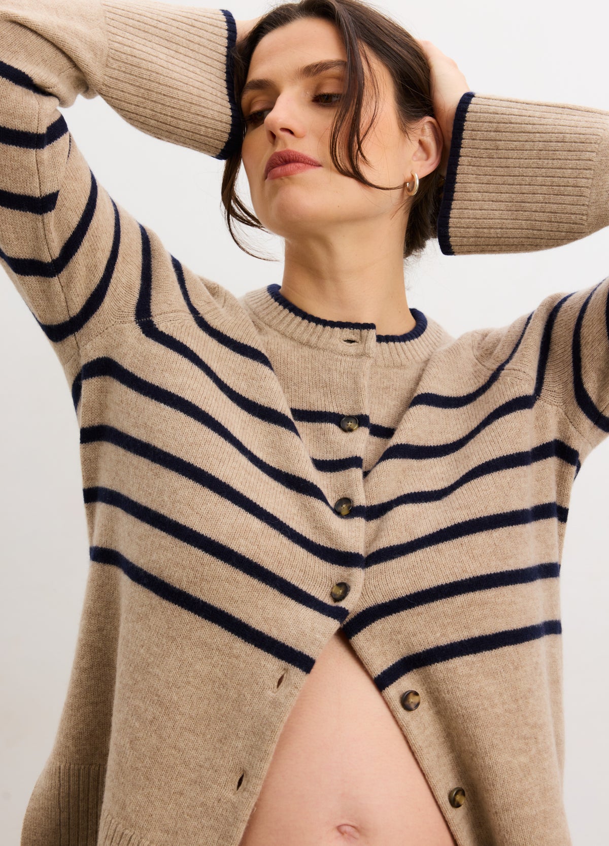 Beige and navy striped button-down maternity cardigan in soft knit with relaxed fit and long sleeves.