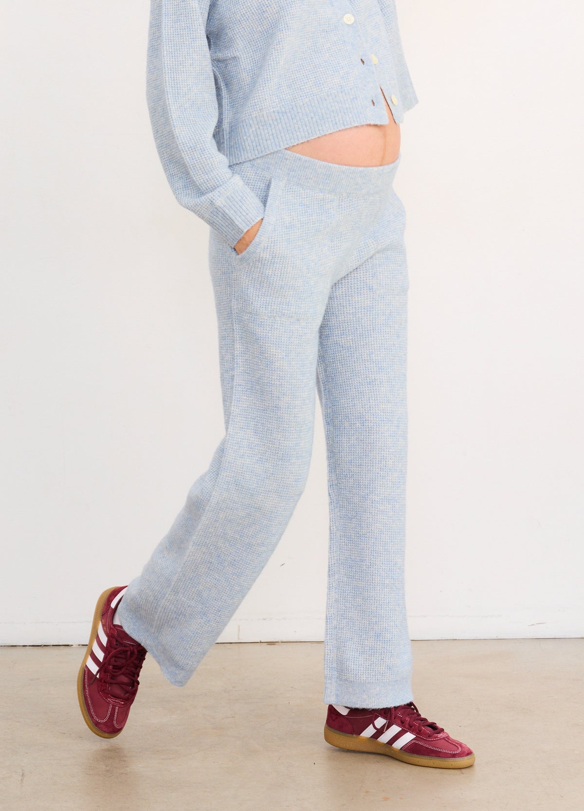 Light blue waffle knit maternity crop pants with a soft, stretchy waistband and relaxed fit.