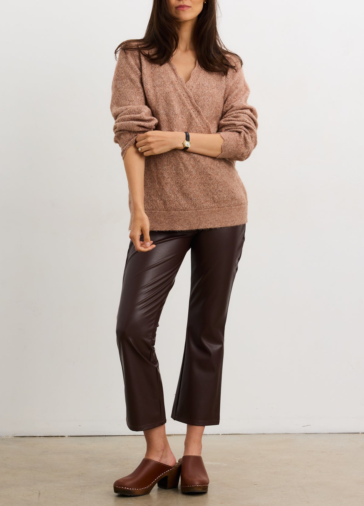 Mocha pointelle knit maternity sweater with V-neck and long sleeves, styled for pregnant women.
