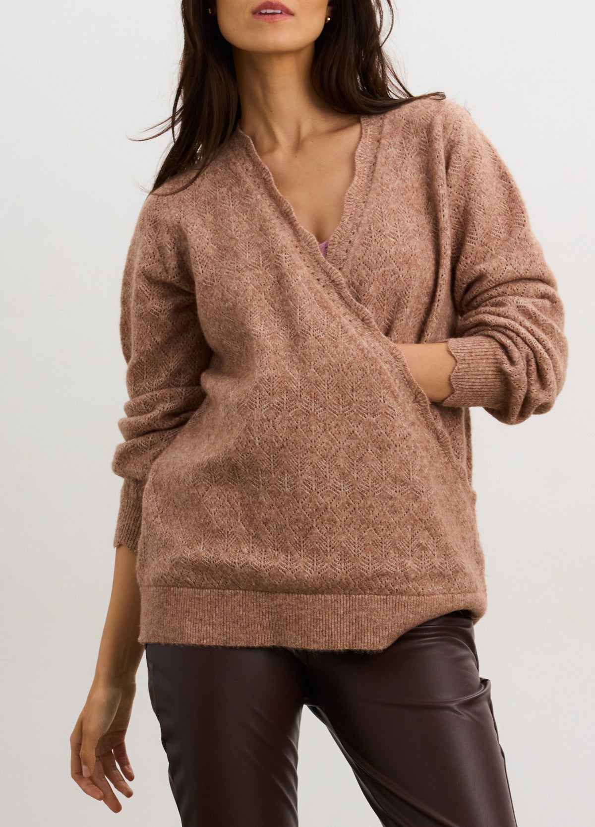 Soft brown cashmere blend pointelle knit maternity sweater with wrap front and long sleeves.