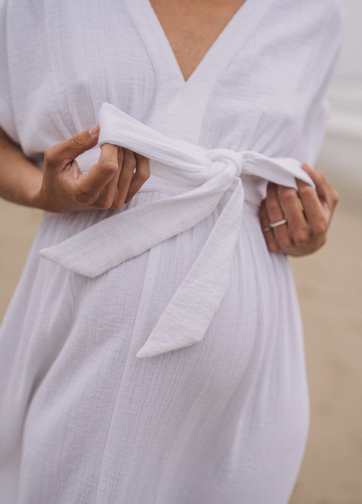 The Rosa Dress - Indigo blue midi maternity dress with V-neck, short sleeves, and gathered waist for nursing and postpartum comfort.