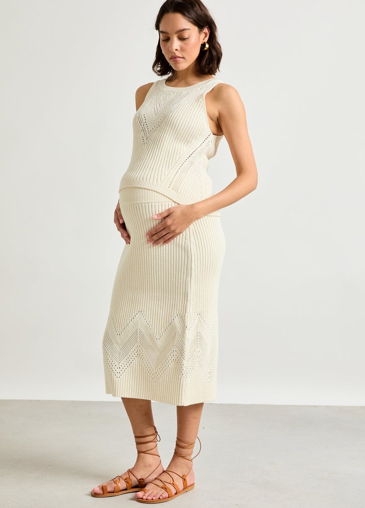 The Delphine Cotton Pointelle Skirt - Vanilla cotton pointelle maternity skirt with delicate knit pattern, designed for pregnancy, nursing, and postpartum wear.