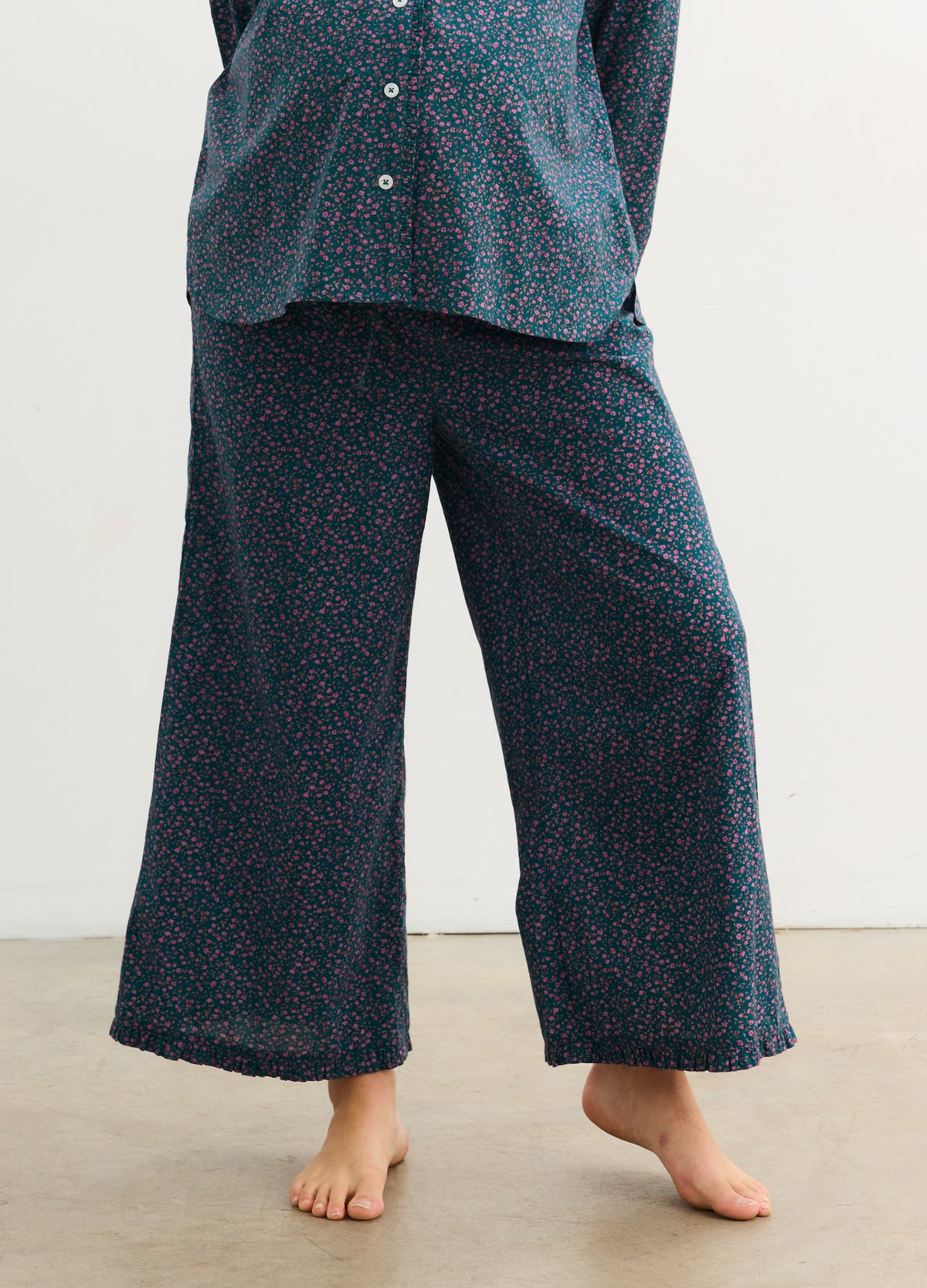 Navy maternity ruffle PJ pants with subtle floral print, loose fit for pregnant comfort.