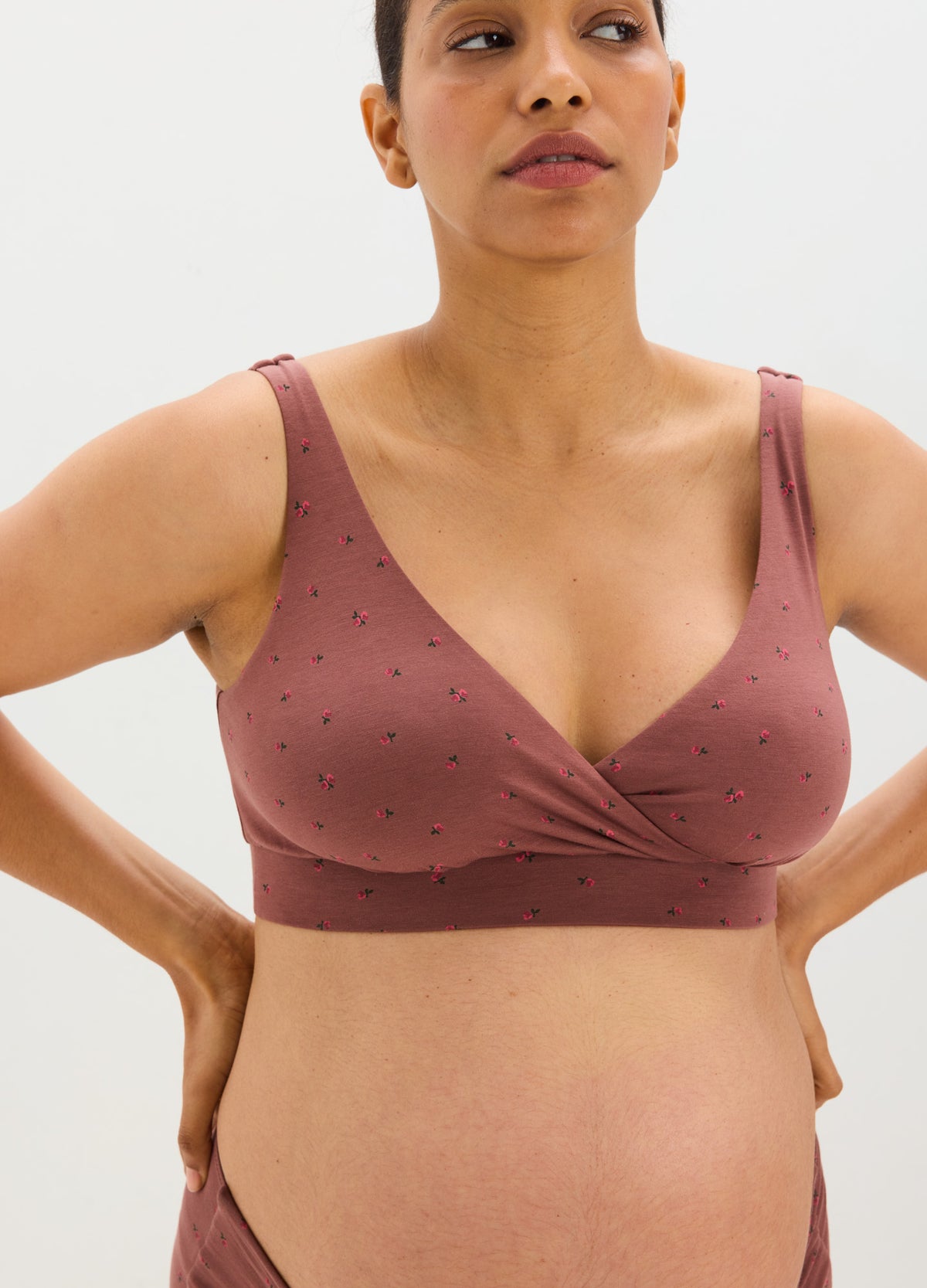 Dusky rose maternity nursing and sleep bra with small floral print, wide straps, and supportive band.