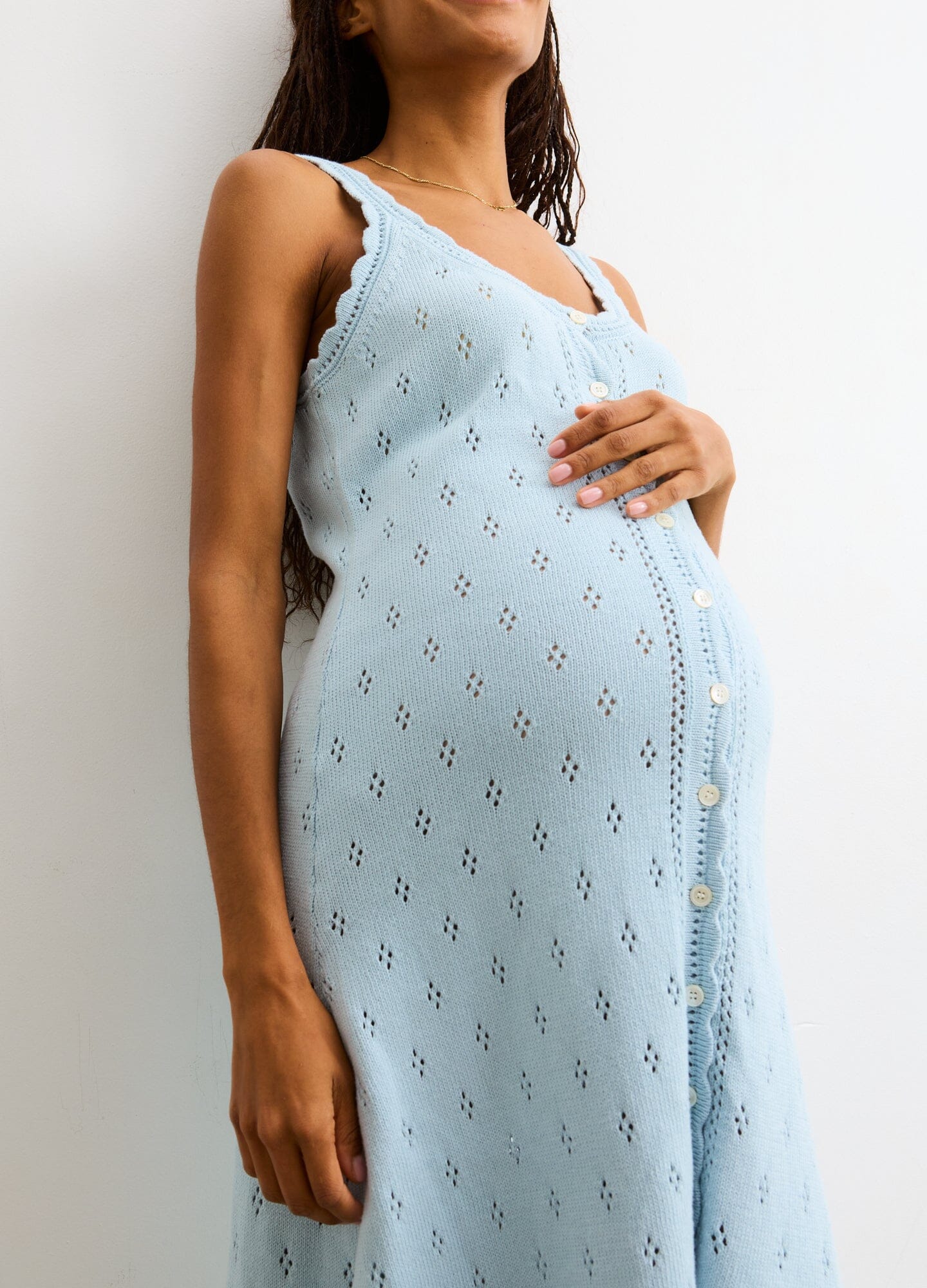 The Eloise Pointelle Nursing Tank Dress - Light blue pointelle knit maternity nursing tank dress with button-front and scoop neckline.