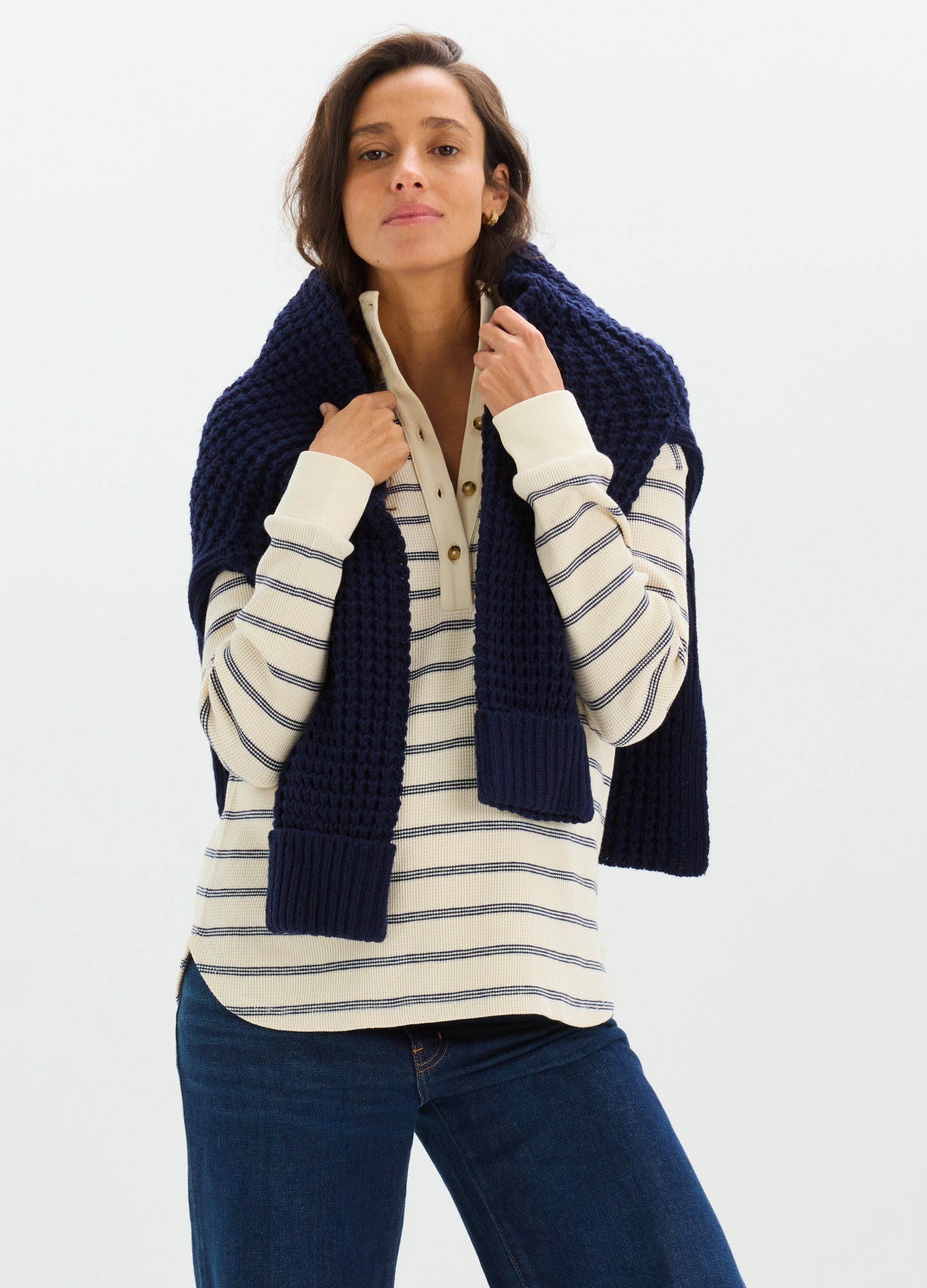 Cream and navy striped waffle knit maternity nursing top with long sleeves and a relaxed fit.