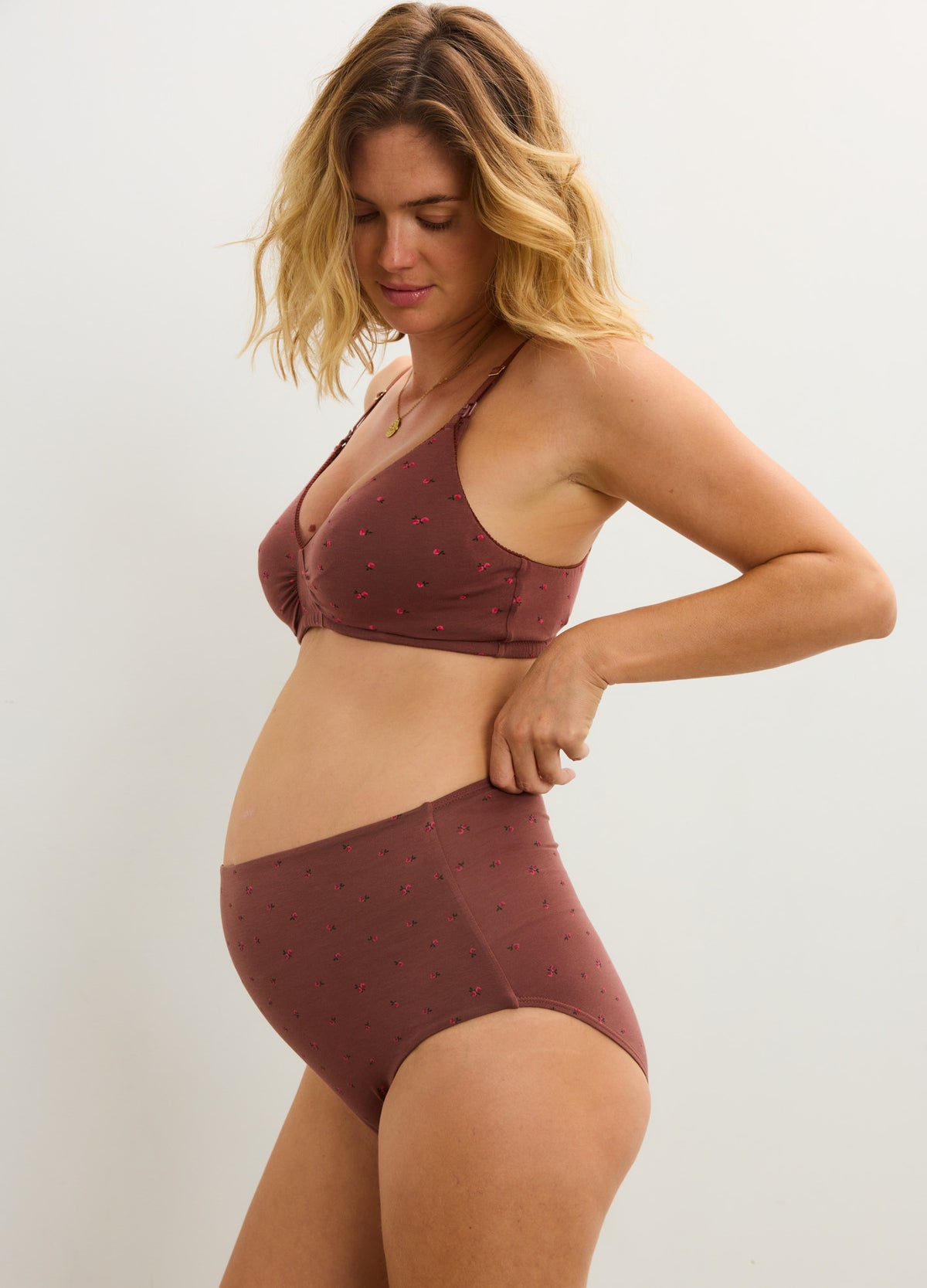 Mauve seamless maternity nursing bra with subtle dot pattern and matching high-waist briefs.