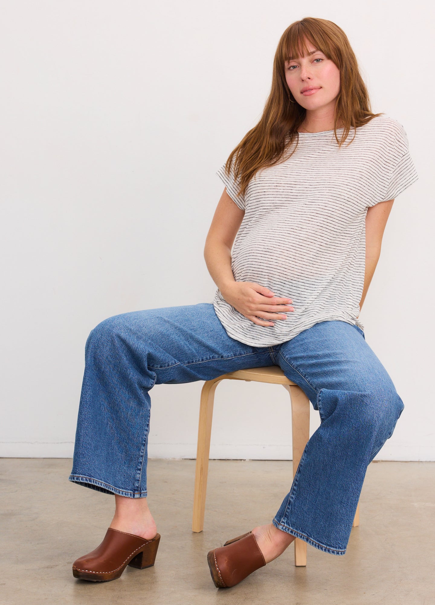 Grey and white striped short-sleeve maternity linen tee with a relaxed fit.