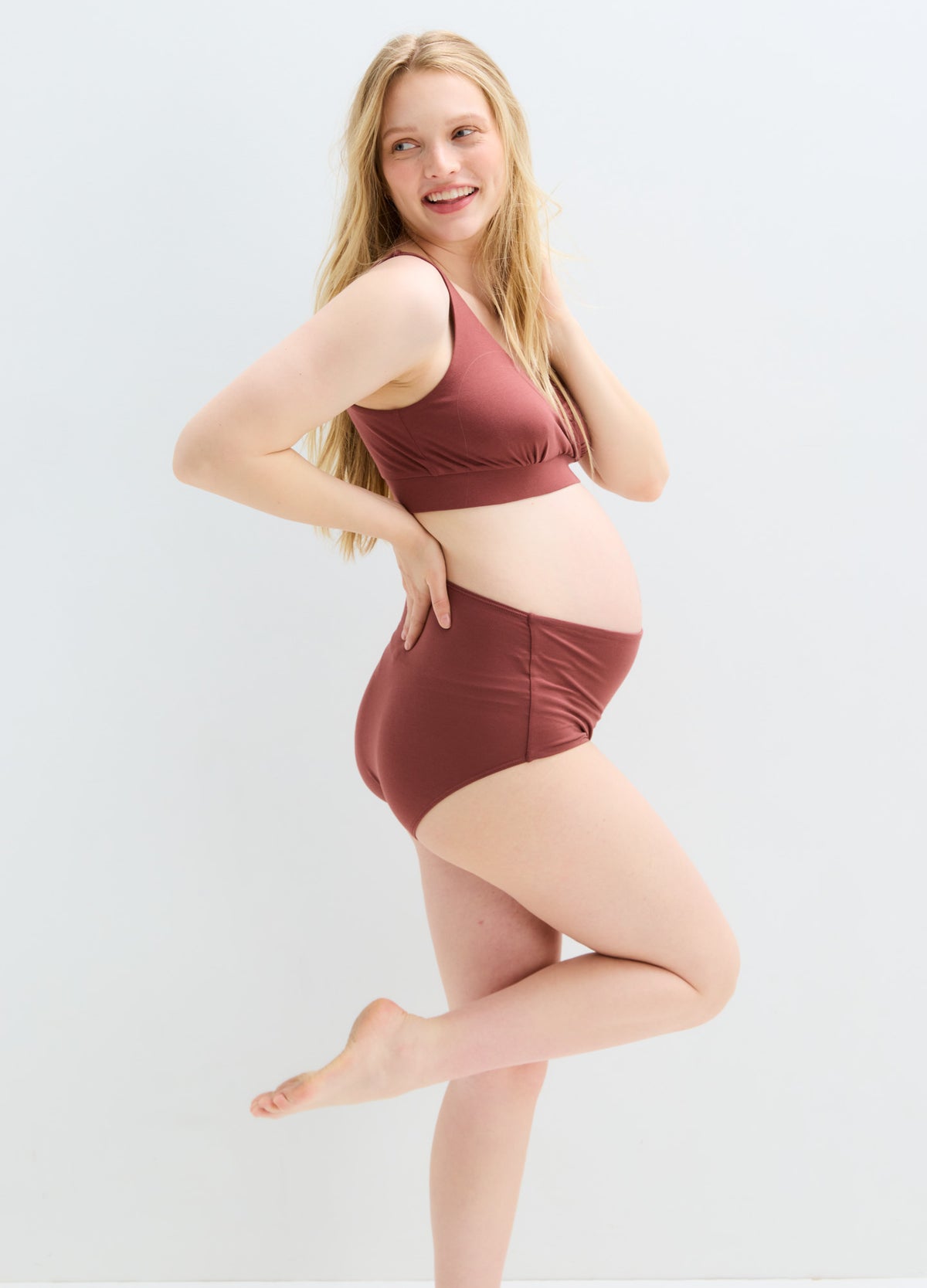 Maternity high-waisted brief in dusty rose with full tummy coverage and soft stretch fabric.