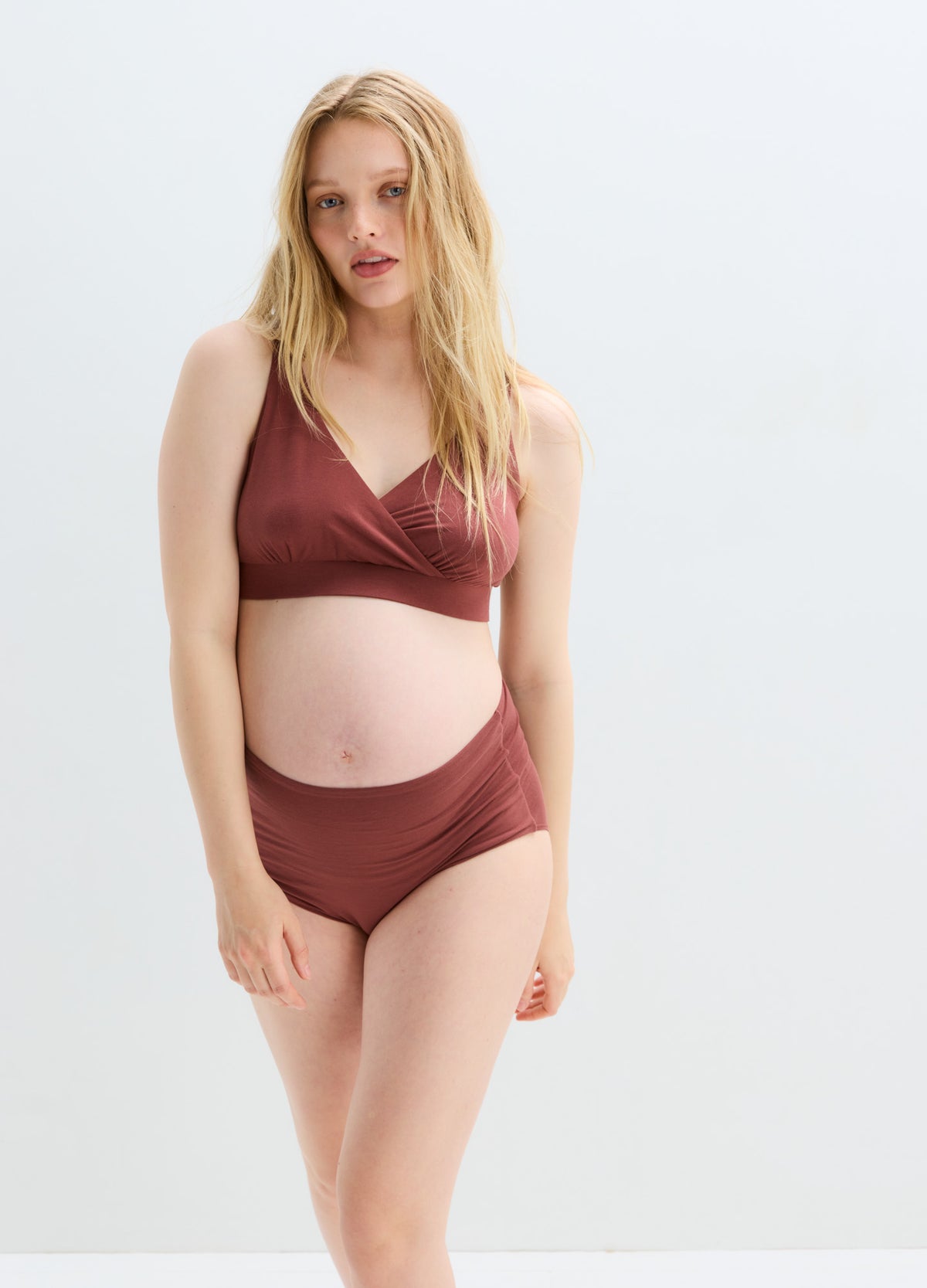 Soft brown maternity nursing bra and matching high-waist briefs in seamless fabric.