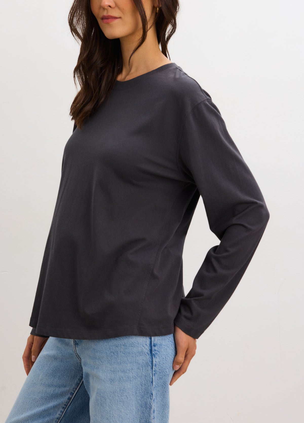 Black washed cotton long sleeve maternity t-shirt with a relaxed fit and crew neckline.