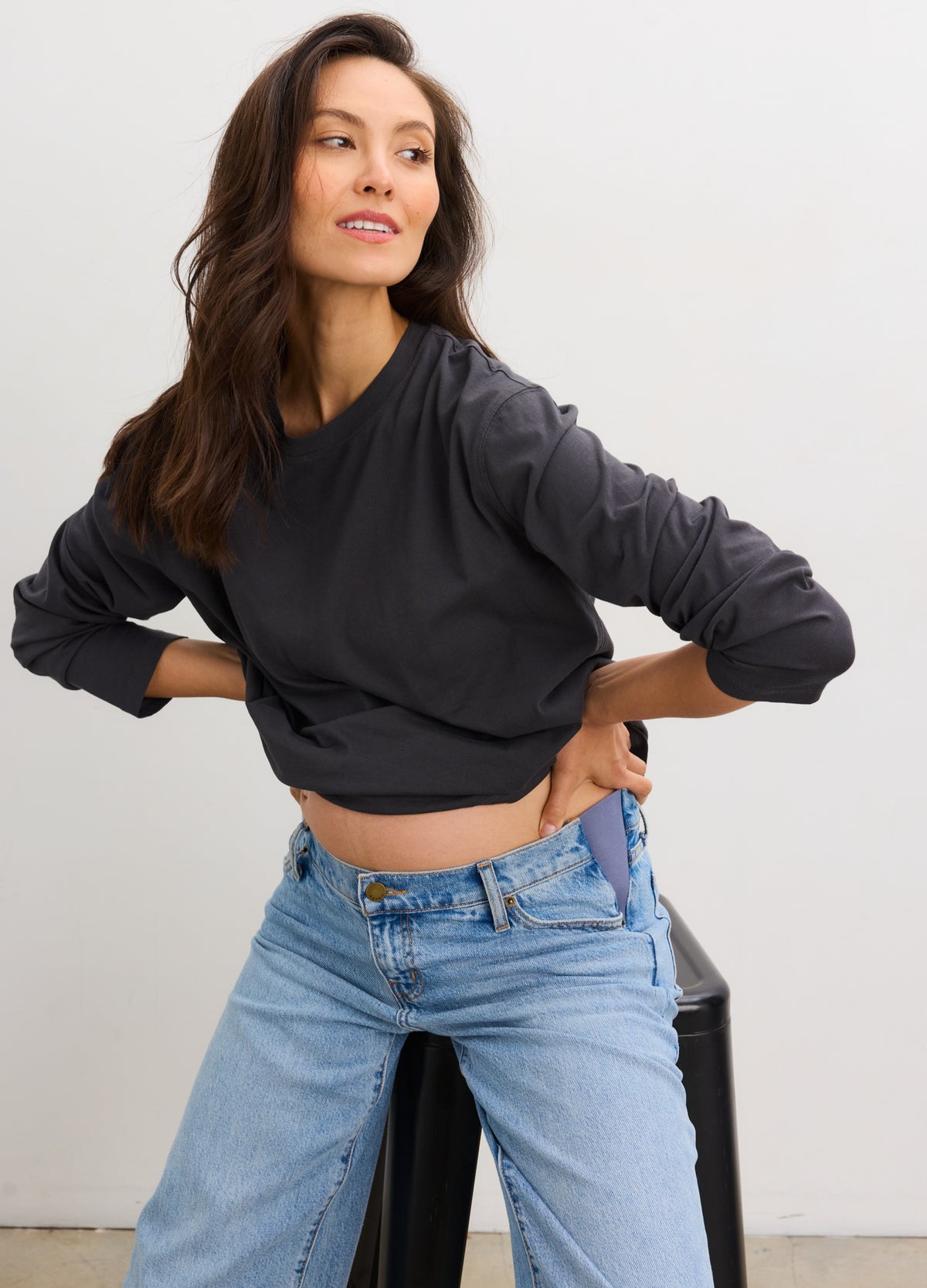 Black washed cotton long sleeve maternity t-shirt with relaxed fit and crew neck.