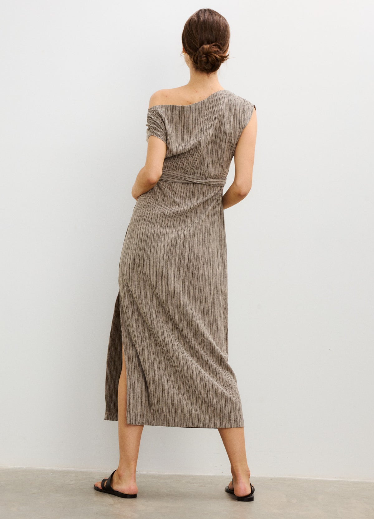 Taupe ribbed knit maternity dress with short sleeves and side slit, midi length.