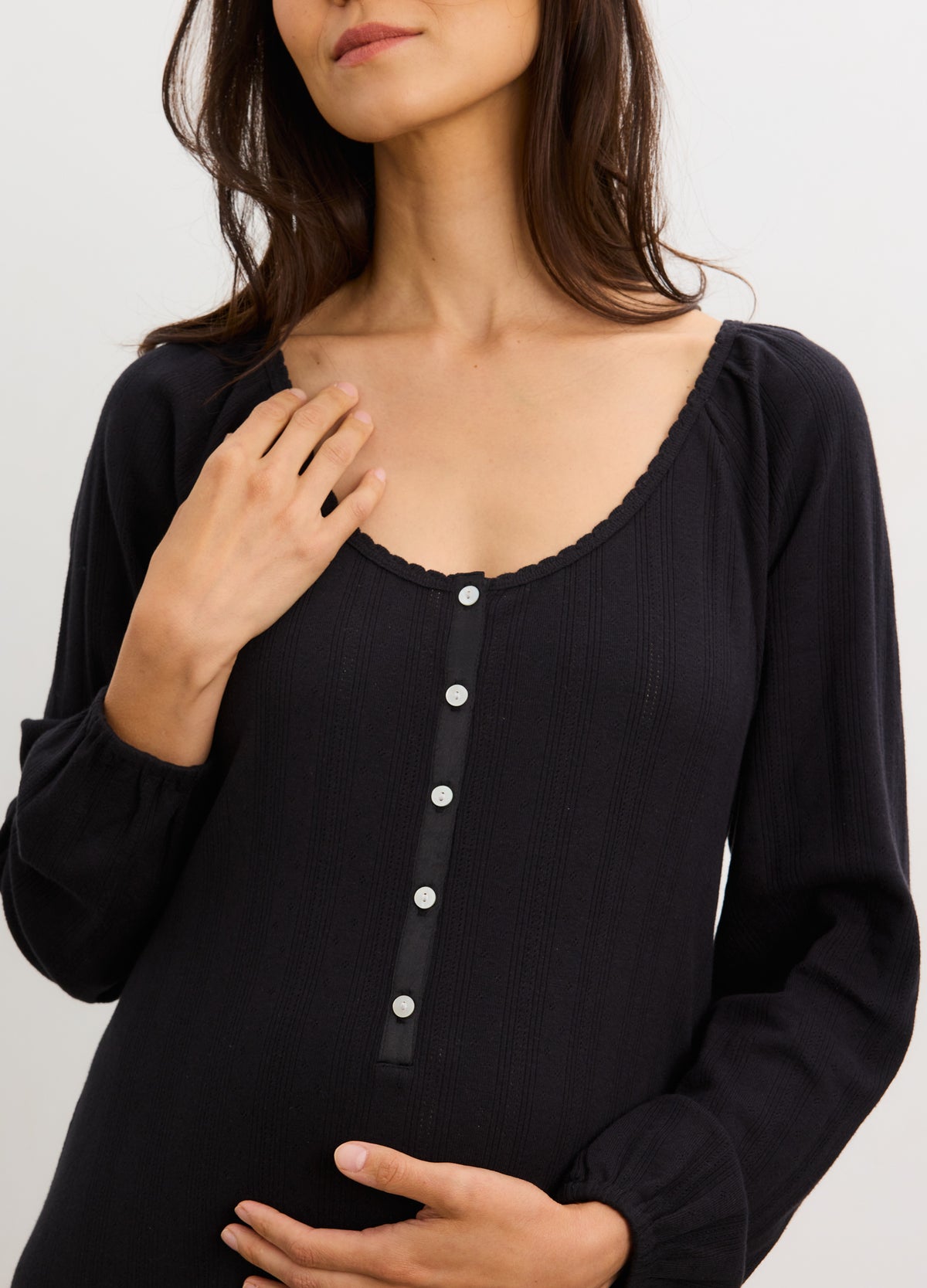Black long sleeve maternity nightgown with button-down front and soft, ribbed fabric.