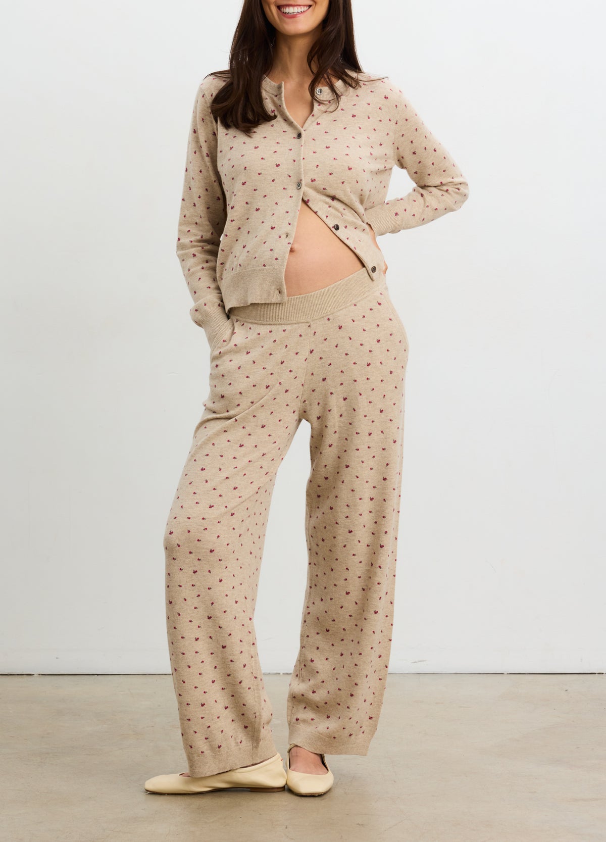 Beige floral maternity knit cardigan with matching wide-leg pants, designed for pregnant comfort.