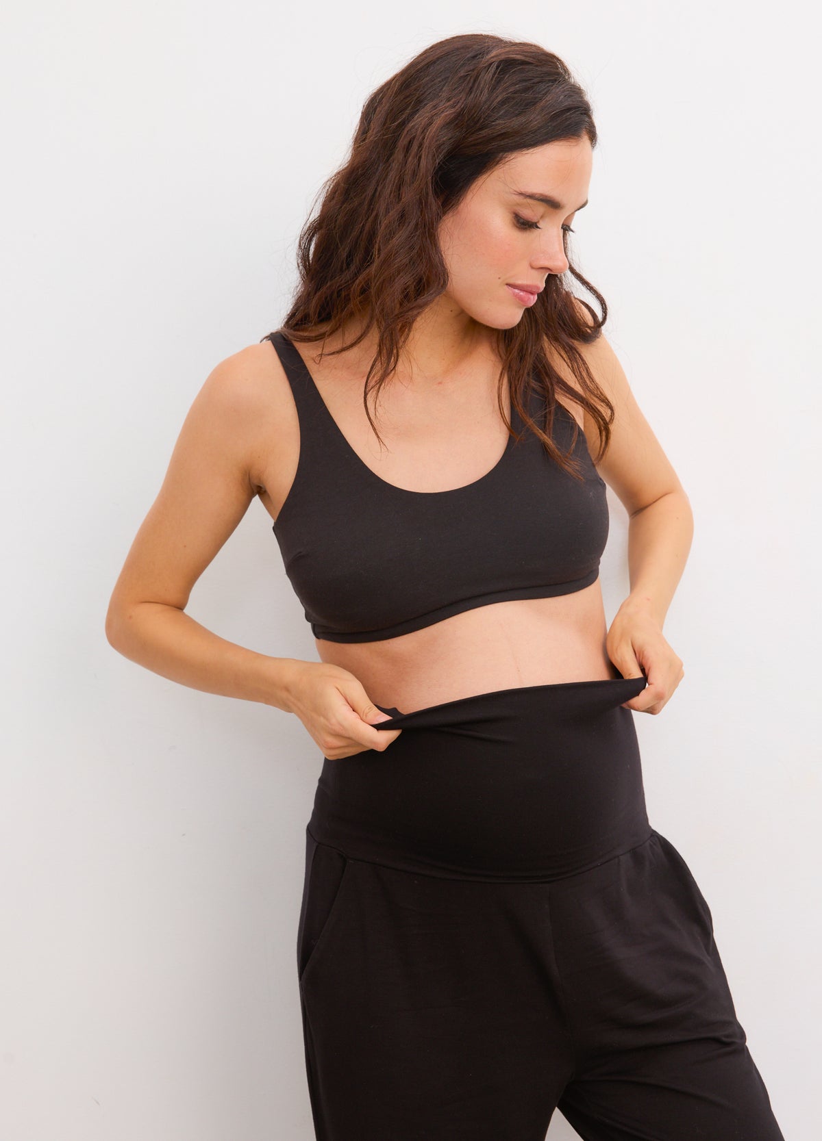 Black maternity lounge pants with a stretchy waistband, relaxed fit, and soft fabric.