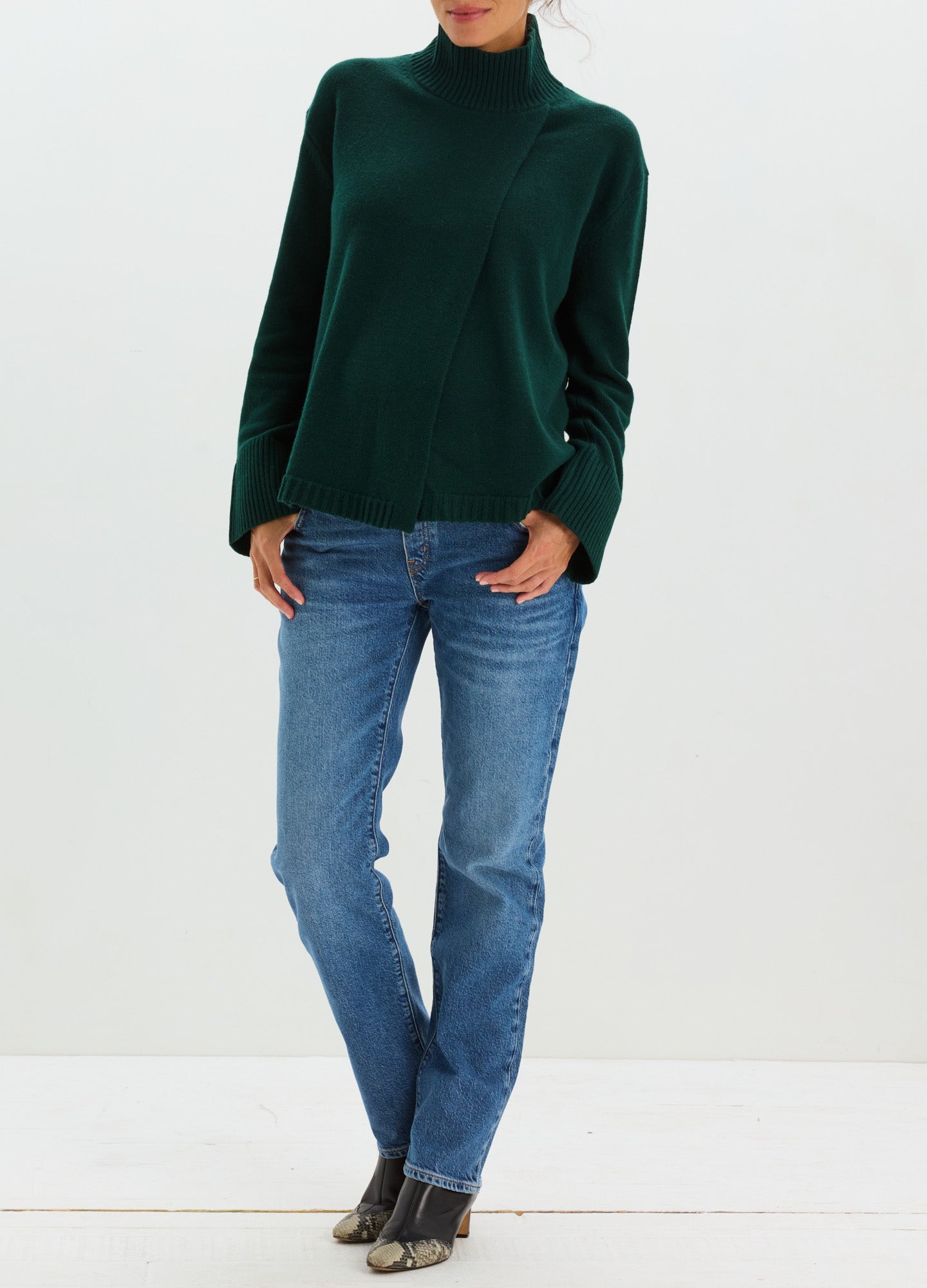 Blue straight-leg maternity jeans with an over-the-bump panel, faded wash, and classic five-pocket style.