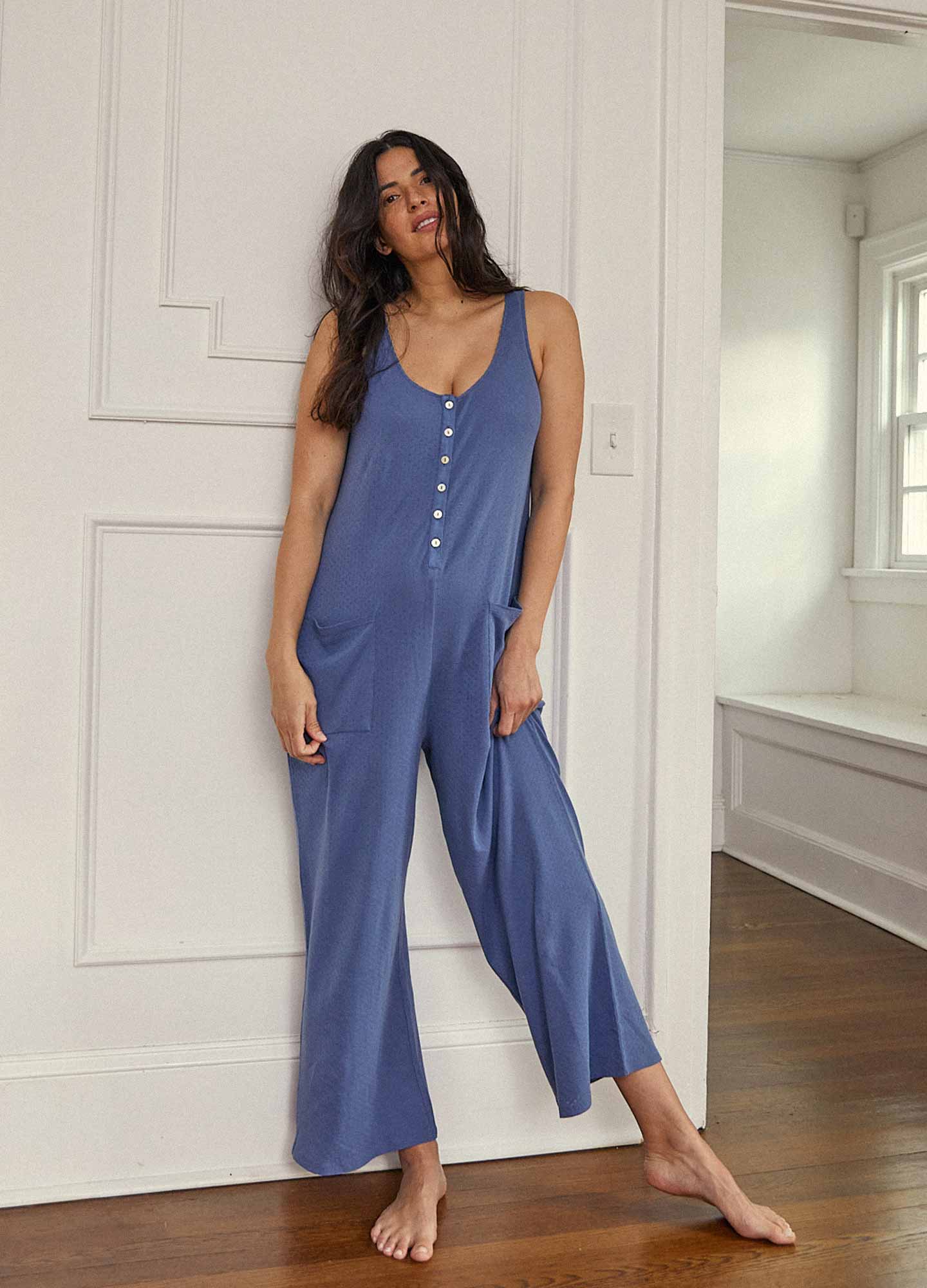 The 24/7 Feeding Jumpsuit POS - Lilac maternity jumpsuit with sleeveless V-neck, nursing-friendly front buttons, and wide-leg fit for postpartum comfort.